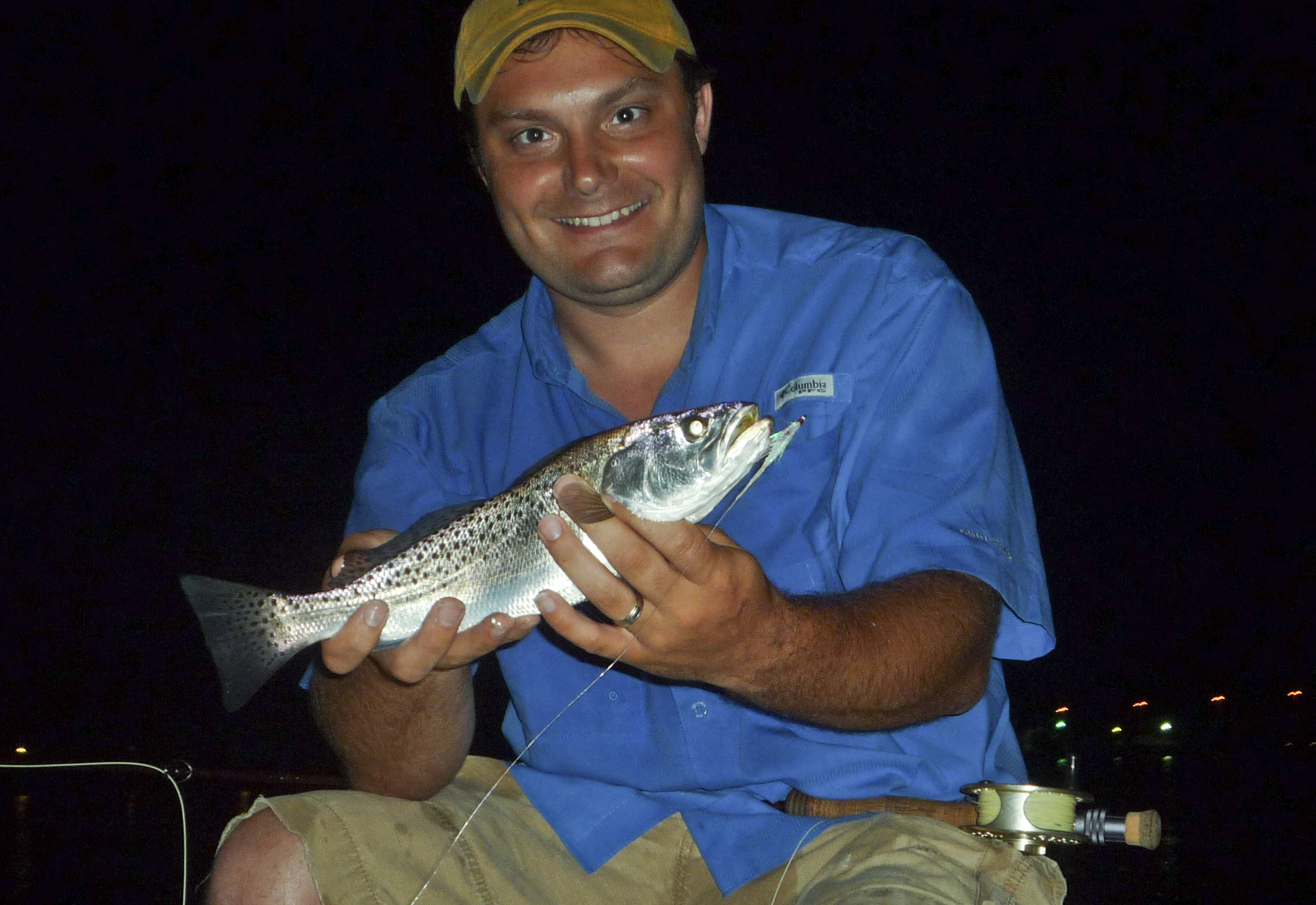 Summertime docklight trout on fly!