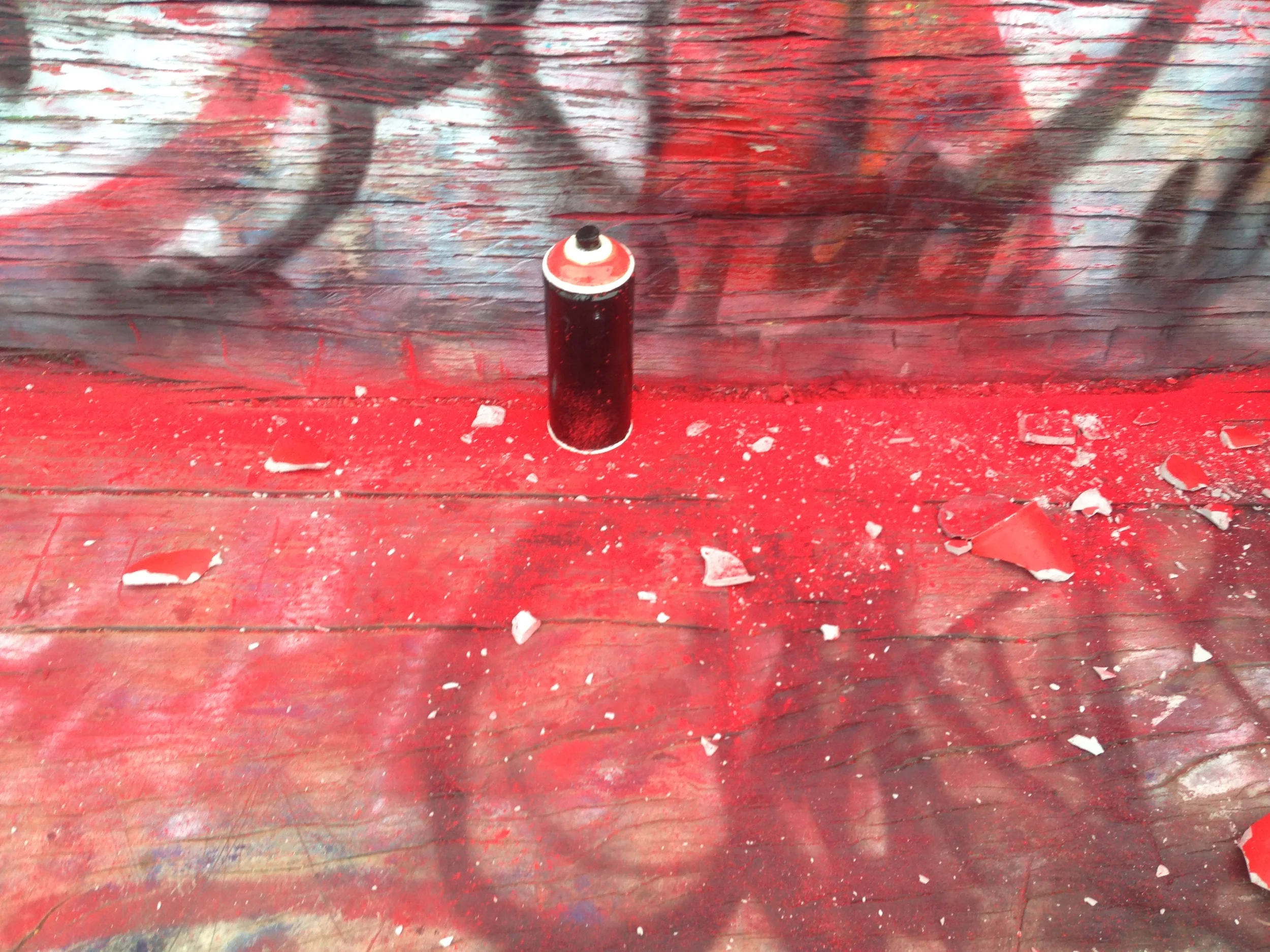  To extend my project beyond the limitations of a single performance, I left behind glazed ceramic spray cans identical to the ones I smashed. 