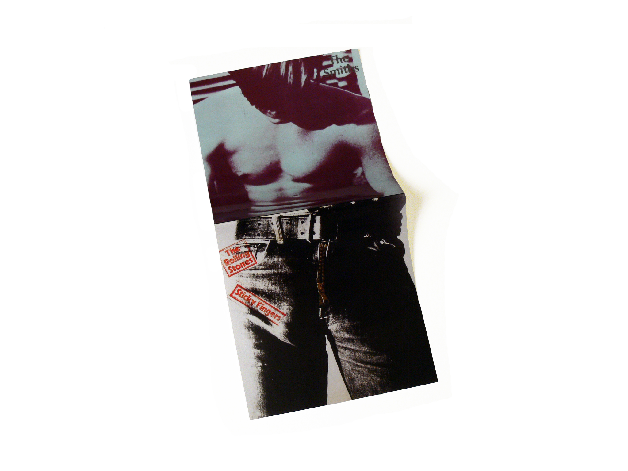 The spine of the book opens to create a portrait of the Factory actor, using the only two LP covers he appeared on. 