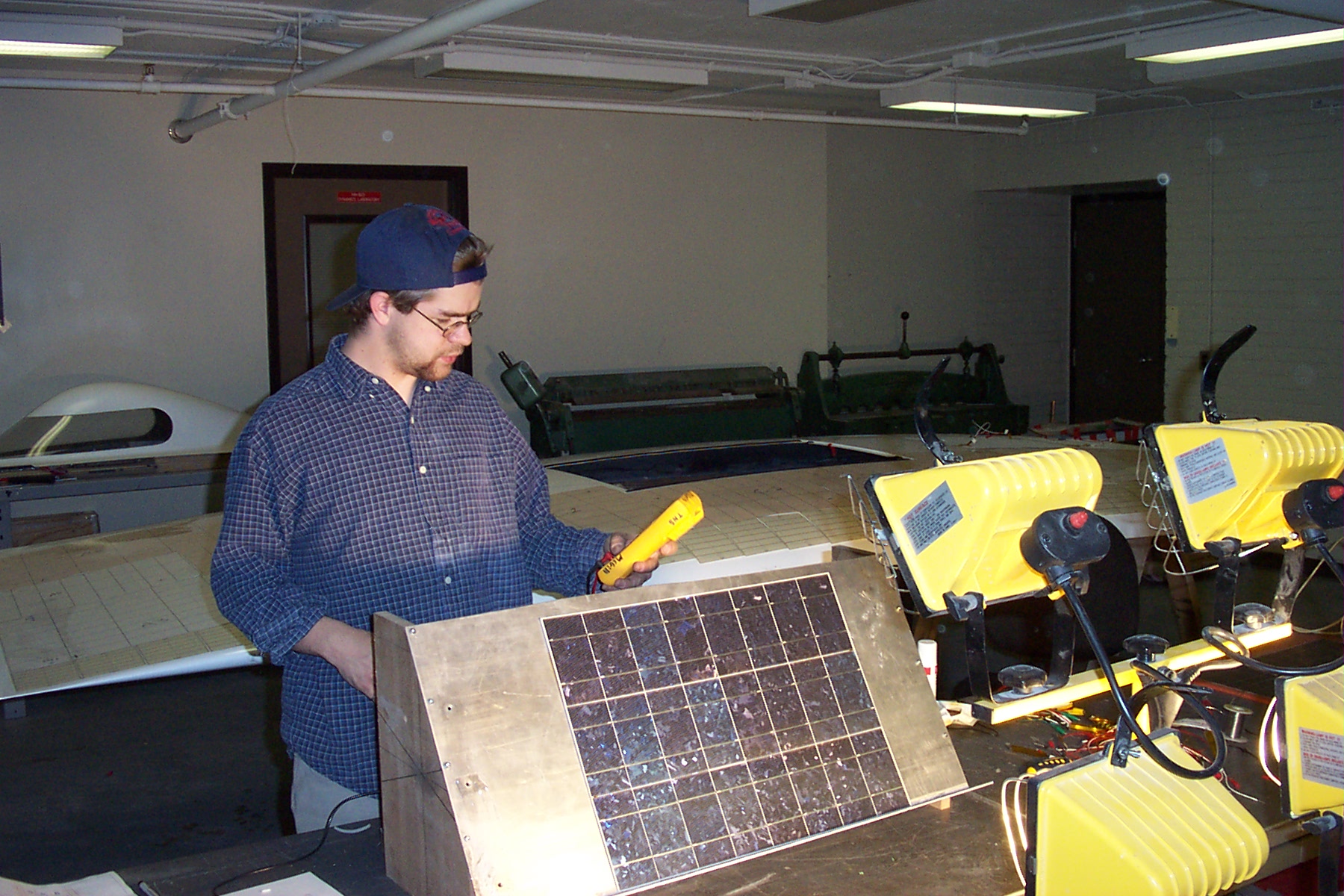 phil next to module test jig with mutimeter.jpg