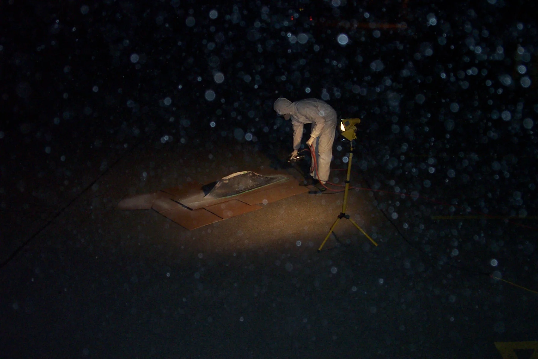 mathieu painting rear fairing outside of mech labs.jpg