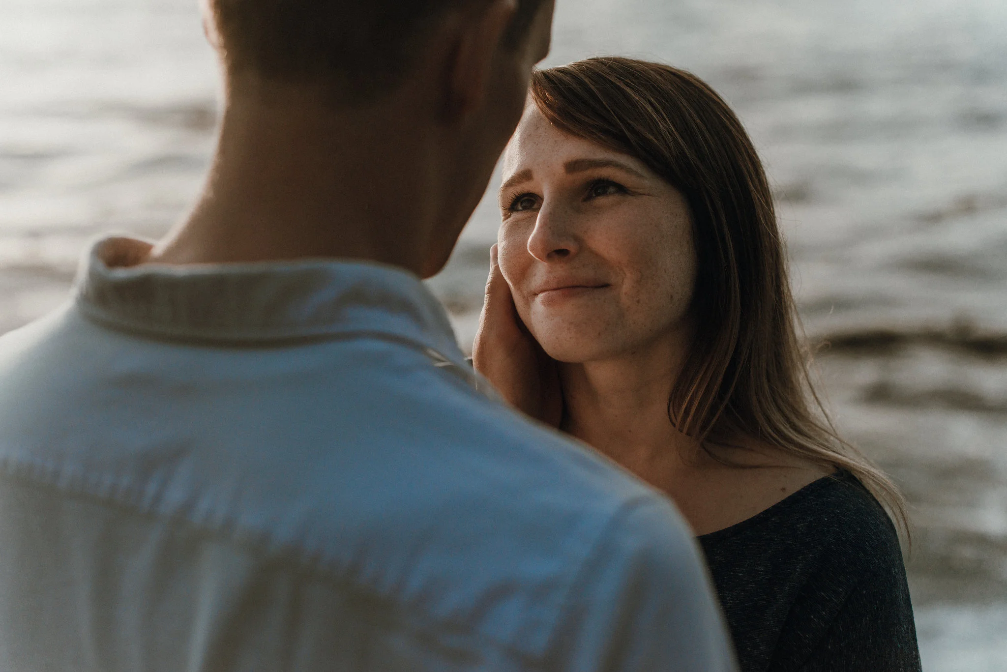 Couple looking at each other lovingly. 