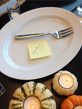 Laying out my serving platters and bowls is essential to staying organized and making sure everything fits on the table. I like to mark each serving piece with a sticky note, making it easy to remember what goes where. It's also handy because guests can assist you in placing items onto the table. They will not have to second-guess if they are grabbing the correct "big white bowl" as you shout from the kitchen (chances are there are more than one)!