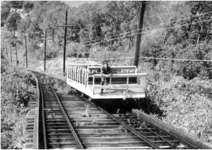 A solitary figure rides a decidedly tired looking railway in a photo that epitomizes the Incline's decline from the 1950s thru the 1970s. Courtesy Beacon Historic Society