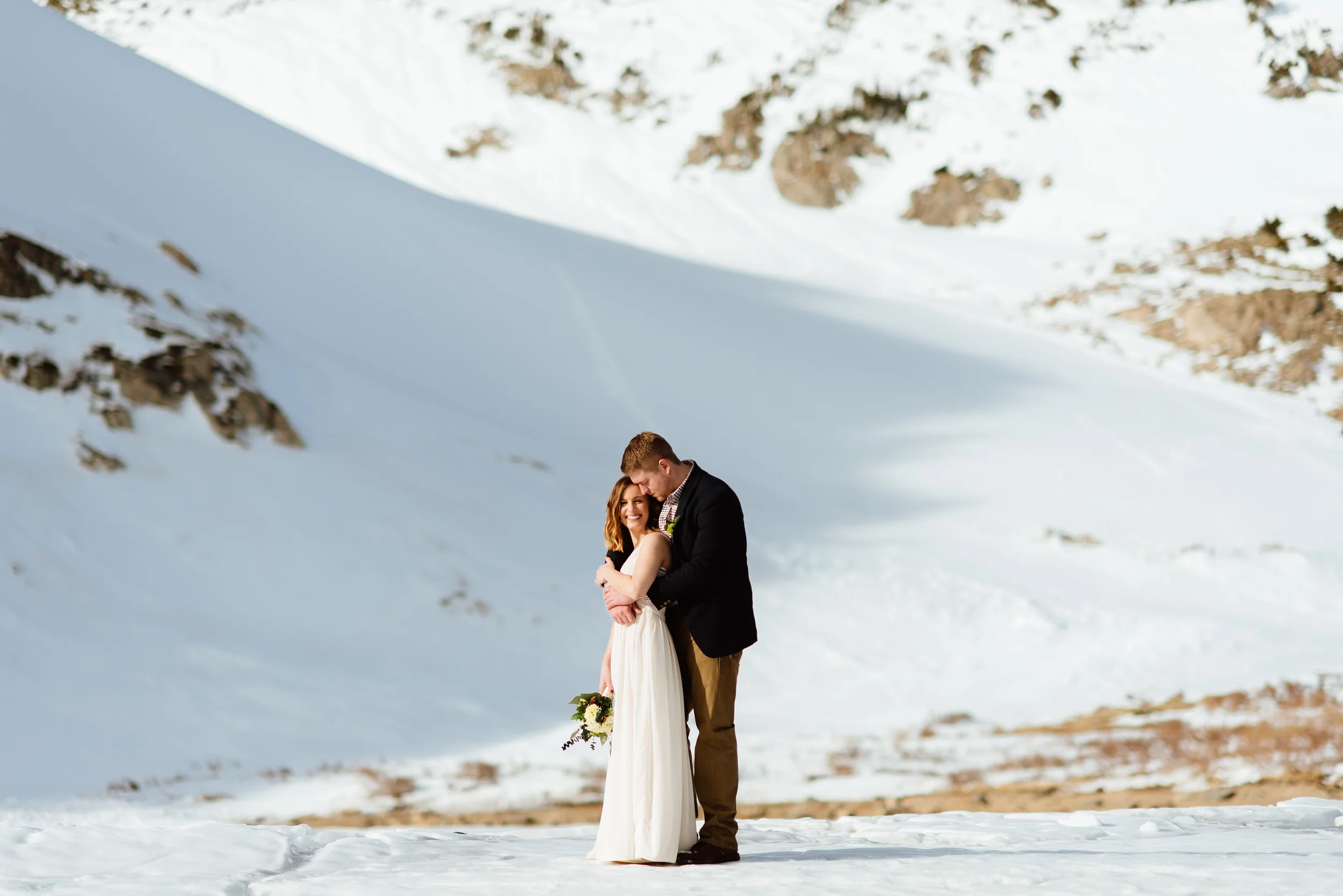 Such a sweet moment shared between this bride and groom. It's so sweet to see a couple who can celebrate their love in such an intimate way! | Mountain wedding photos by Colorado elopement photographer, Maddie Mae. 
