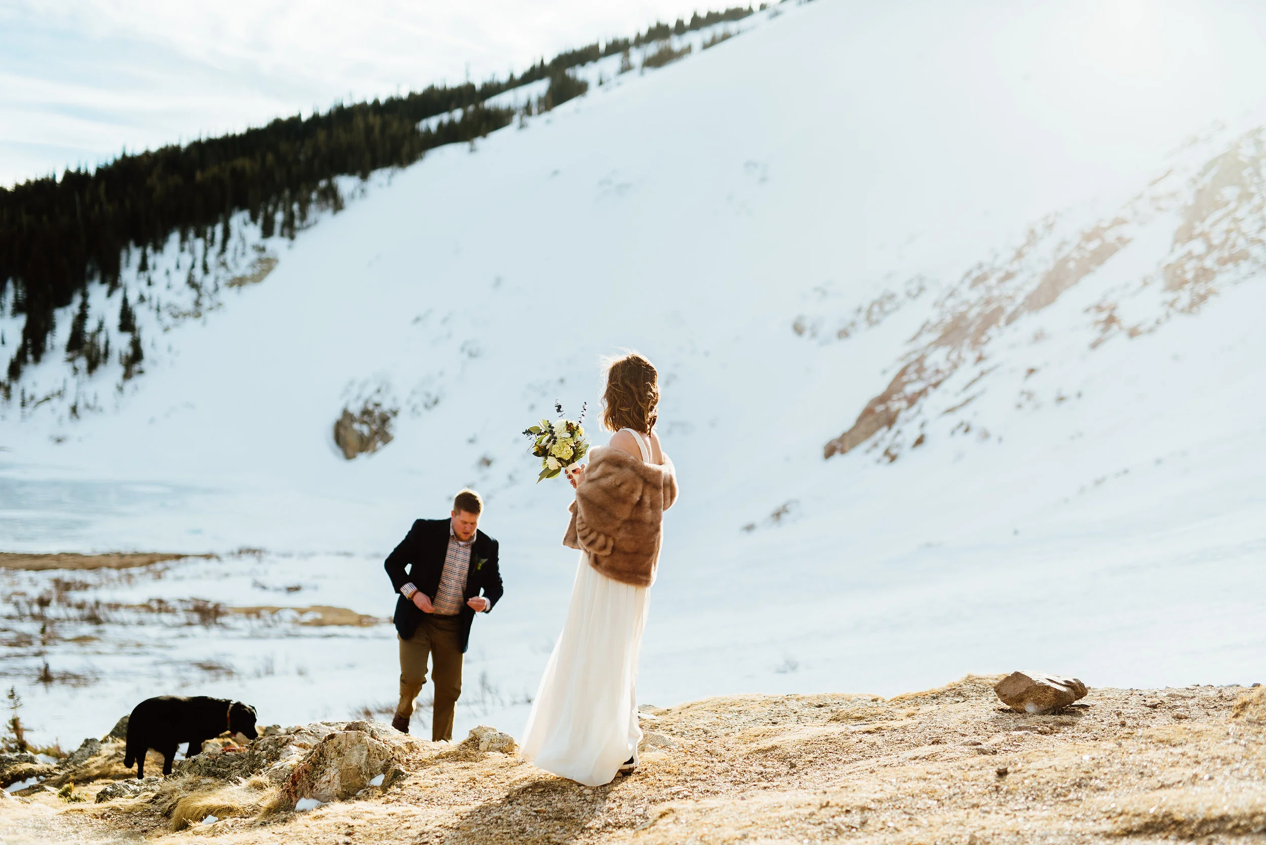 I love this gorgeous view on St. Mary's Glacier in Idaho Springs, Colorado. It's such a gorgeous and wild outdoor ceremony spot perfect for a winter wedding. | Intimate mountain wedding photos by outdoor elopement photographer, Maddie Mae.