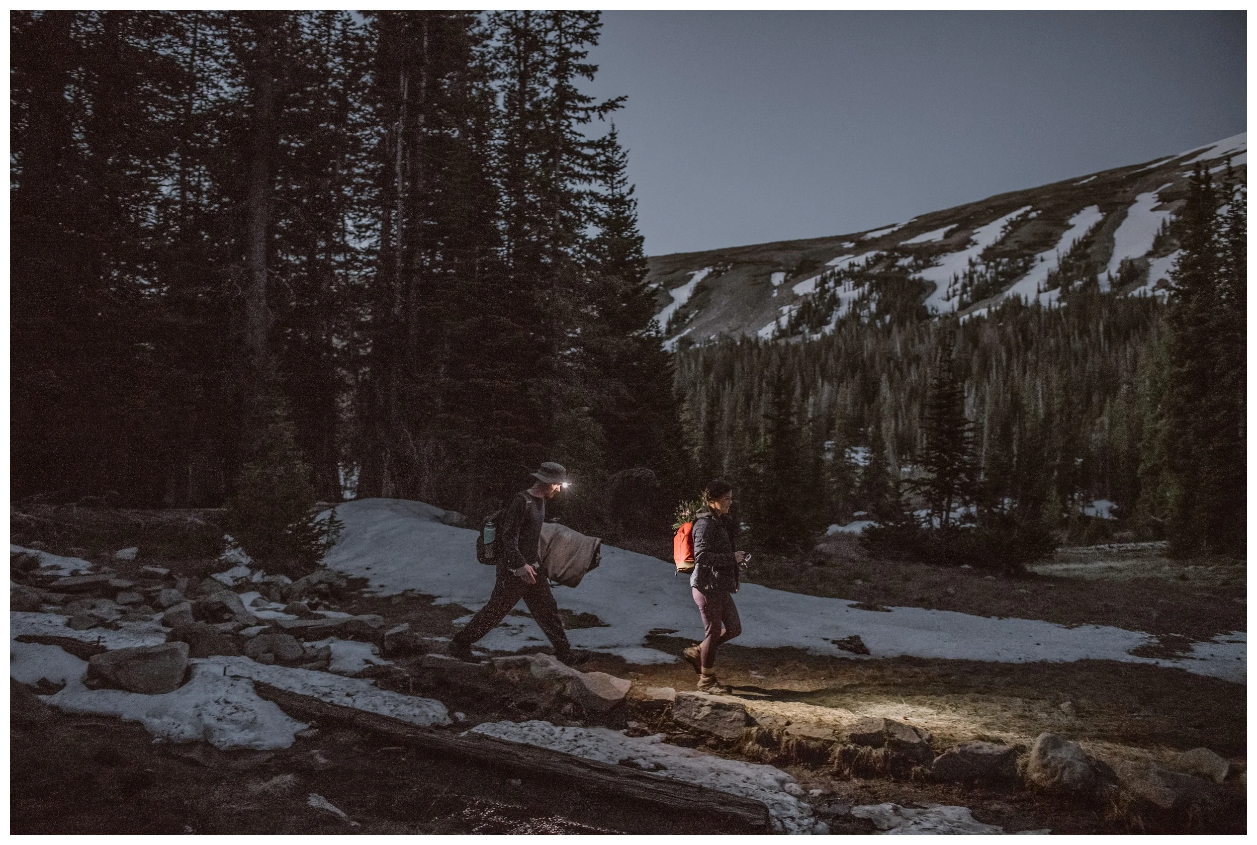 Starting before dawn, Karen and Matt make their way up the trail for Lake Isabelle, a high alpine lake outside Nederland, Colorado. Photo by Adventure Instead, Maddie Mae.
