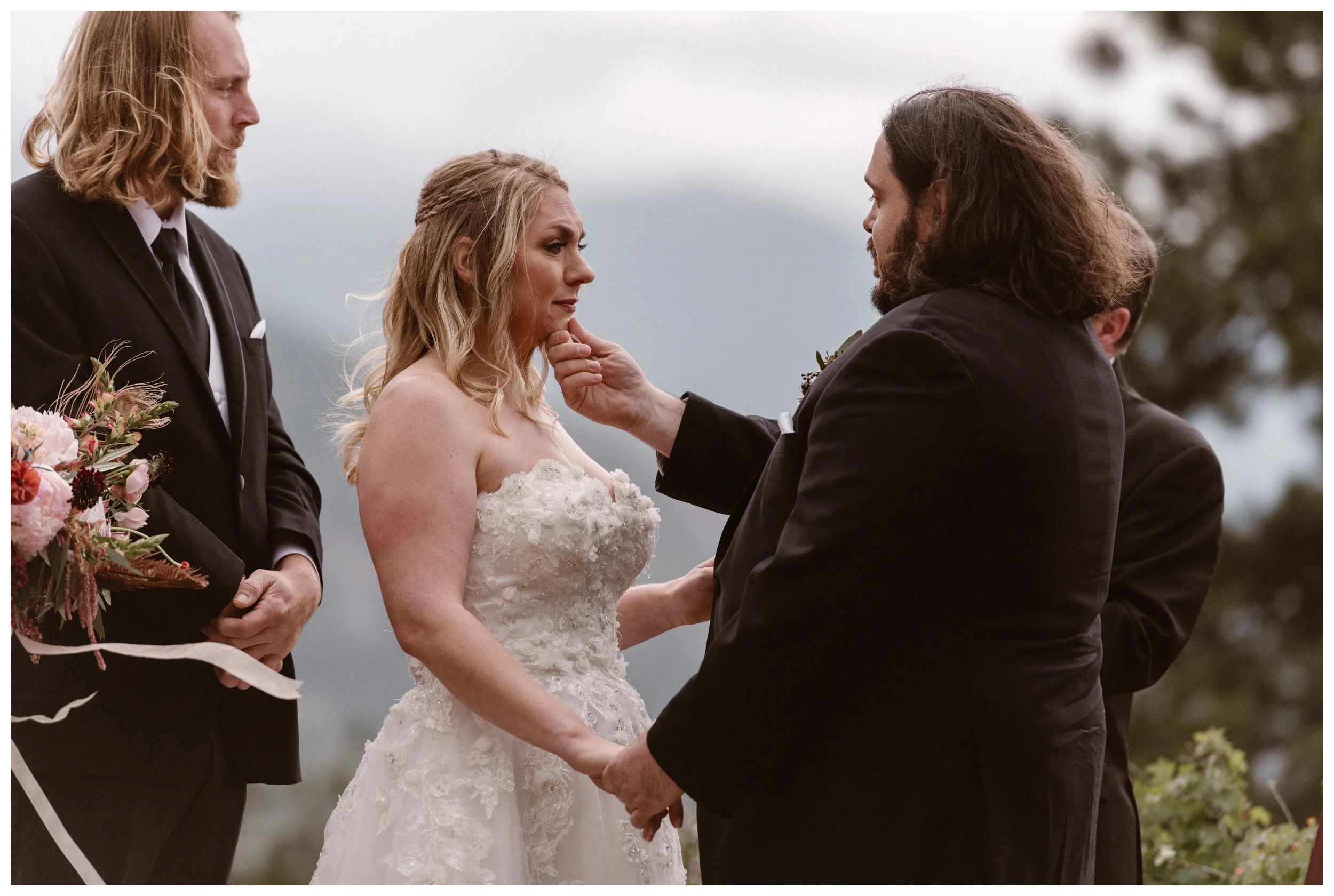 A tearful and emotional moment during Alicia and Zach’s intimate elopement ceremony at Rocky Mountain National Park in Estes Park, Colorado. Photo by Adventure Instead, Maddie Mae.