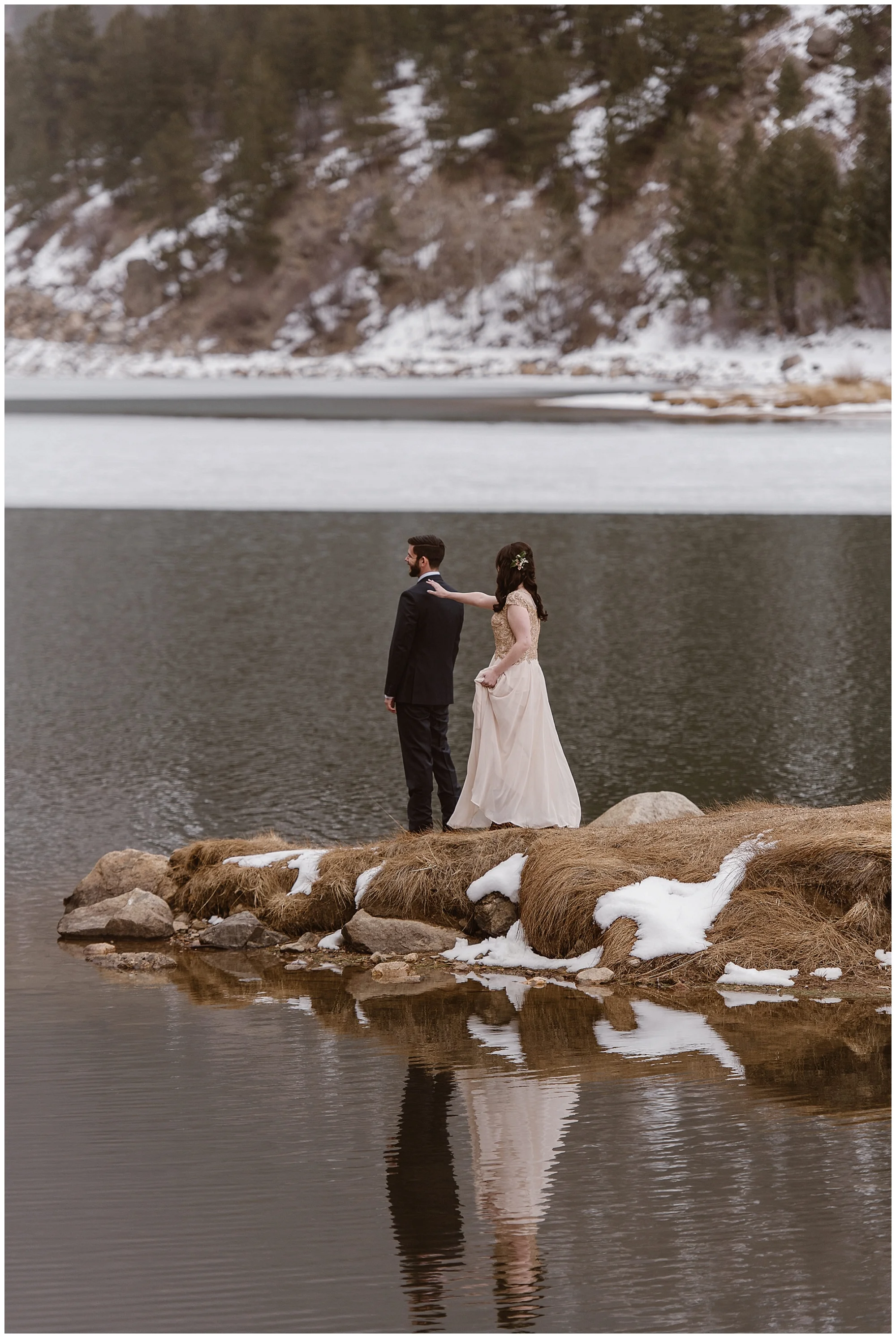A first look during an elopement is still possible! Marlayna and Austin had a first look at Georgetown Lake, in Georgetown, in Colorado’s Rocky Mountains. Photo by Adventure Instead, Maddie Mae Elopement Photographers.