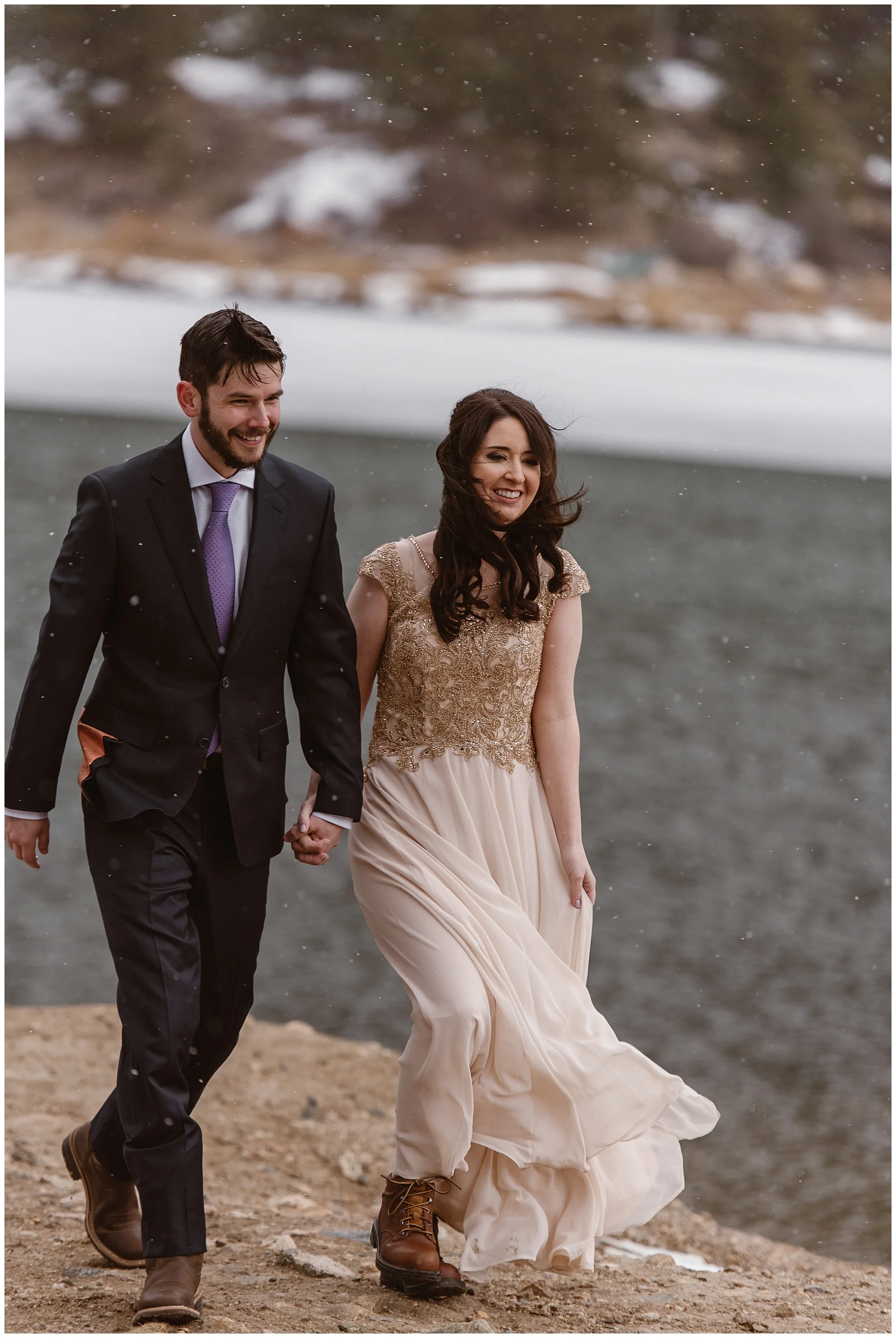 The snow started to gently fall before Marlayna and Austin’s self solemnizing elopement ceremony in Sapphire Point, Dillon, Colorado. Photo by Adventure Instead, Maddie Mae Elopement Photographers.