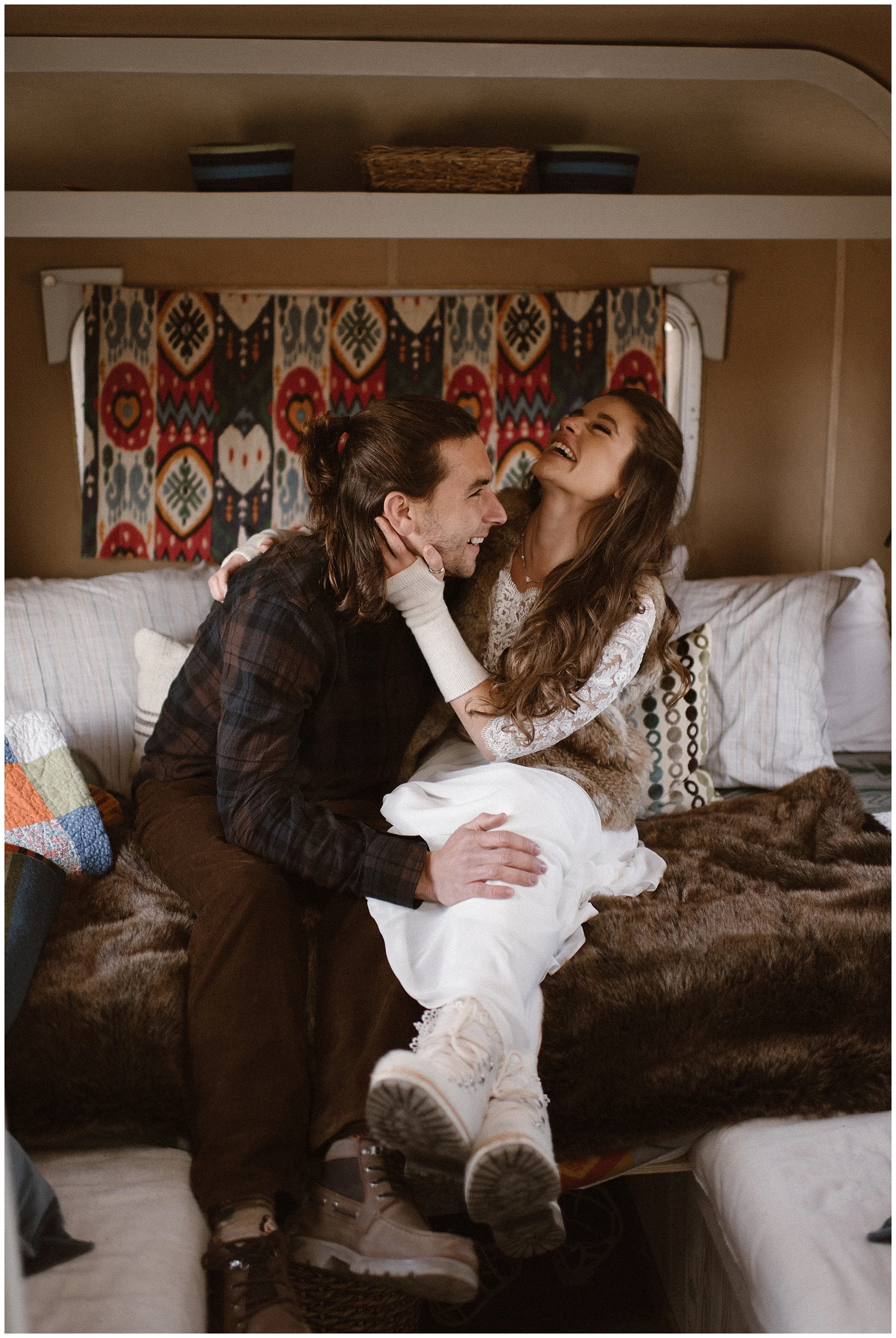 For a winter elopement, it’s key to take breaks to warm up frequently. This couple used their renovated trailer as the perfect break spot as they eloped at Great Sand Dunes National Park in Colorado. Where you elope and how you say your vows matters! Photo by Maddie Mae, Adventure Instead Elopement Photographers.