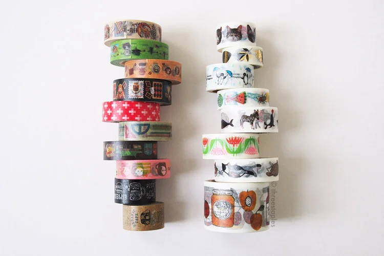 Tapes with colored backgrounds (left stack) vs. tapes with “clear” backgrounds (right stack).