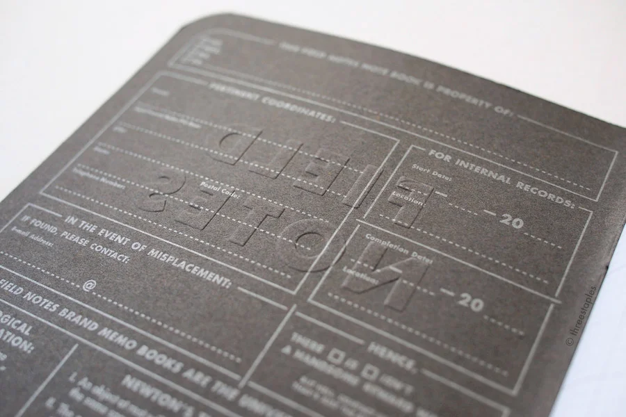 Delicious debossing shown on the reverse side of the front cover of Sciences ( Mohawk Loop 110#C “Urban Gray” Antique Vellum).