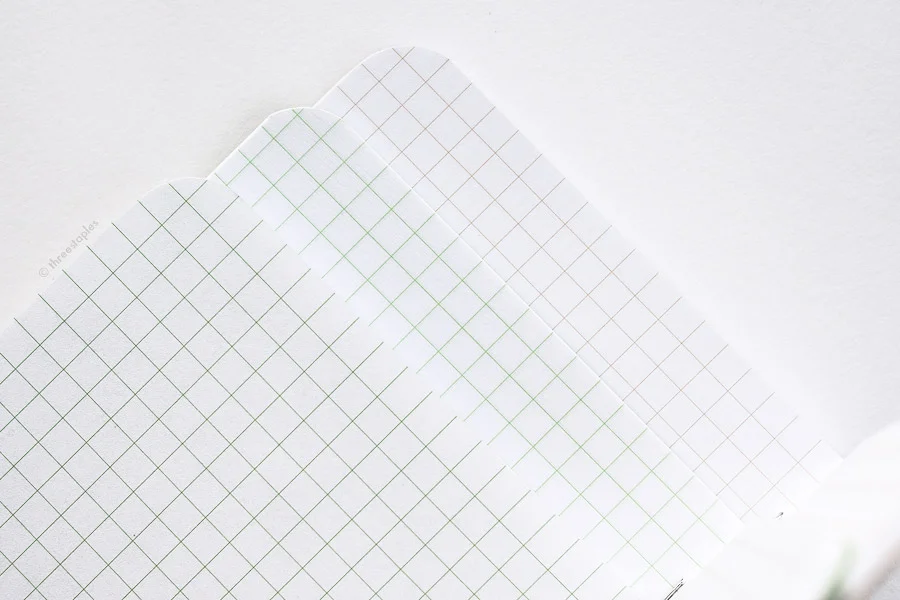 Quick grid comparison (from left): Green grid in Capsule AW14, slightly lighter green grid in GSG, Original light brown grid.