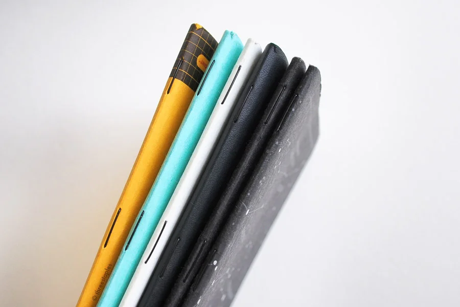 Black staples (from left): Utility , Sweet Tooth , Capsule (AW 2014), Lunacy , Pitch Black (1st version), and Night Sky.