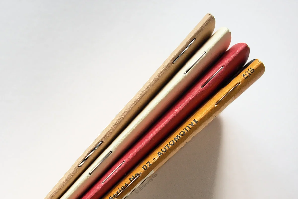 From left: regular Kraft (silver staples), 2018 Rooster (“Wheat Gold” staples), Heartbeat (“Wheat Gold” staples), and Workshop Companion (brass staples).