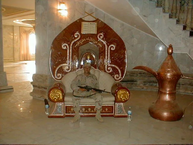 Anspaugh in Saddam's chair.jpg