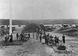  the earthworks in the background at fort smith