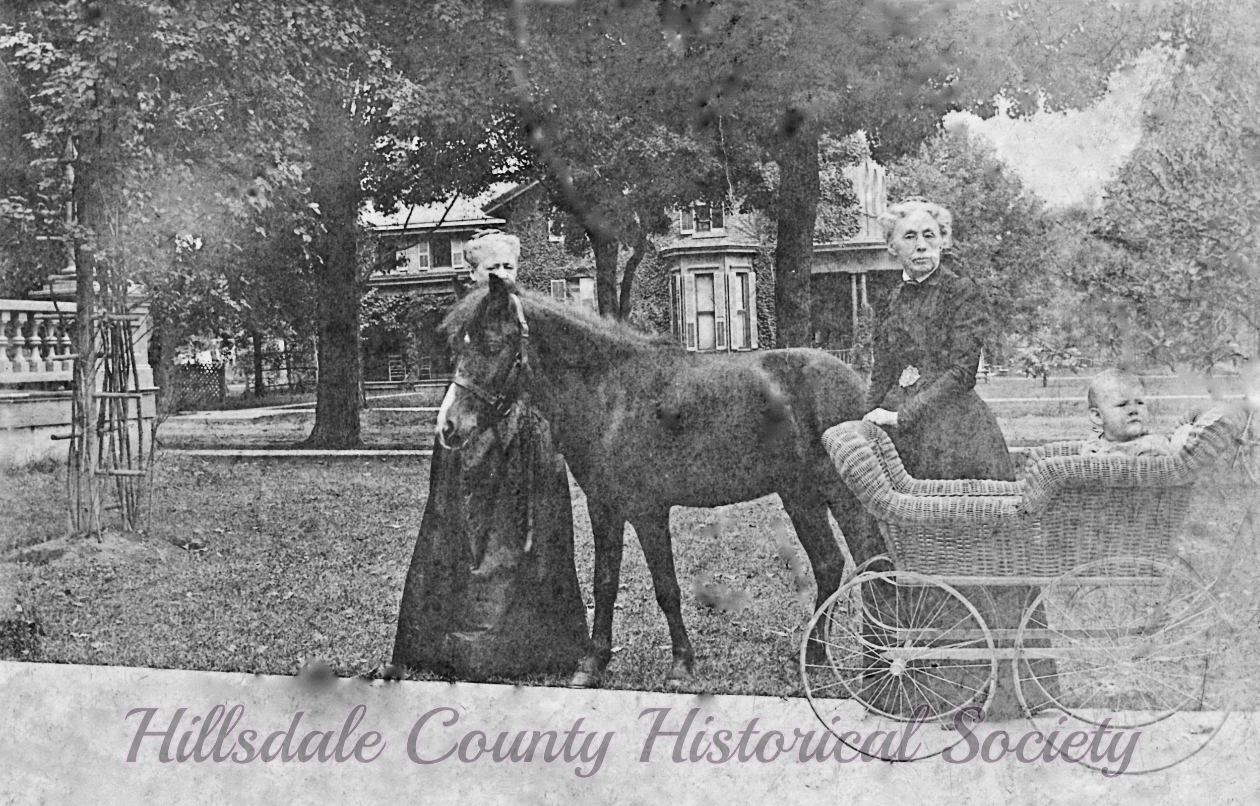 Harriet Wing Mitchell, Eliza and J.R. Sutton, who lived across McCollum Street from the Mitchells