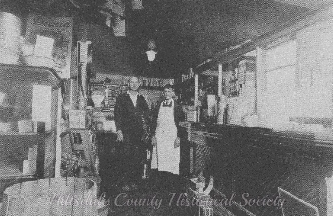 Burnett’s grocery store in osseo, showing echo ash and john mcneal, meat butter.