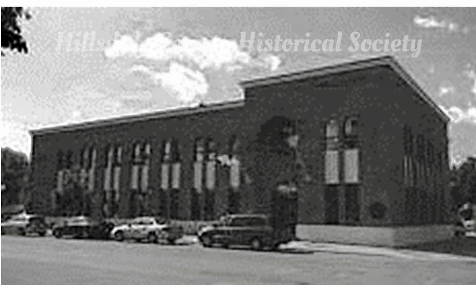 County national bank now stands where the sutton block was originally built
