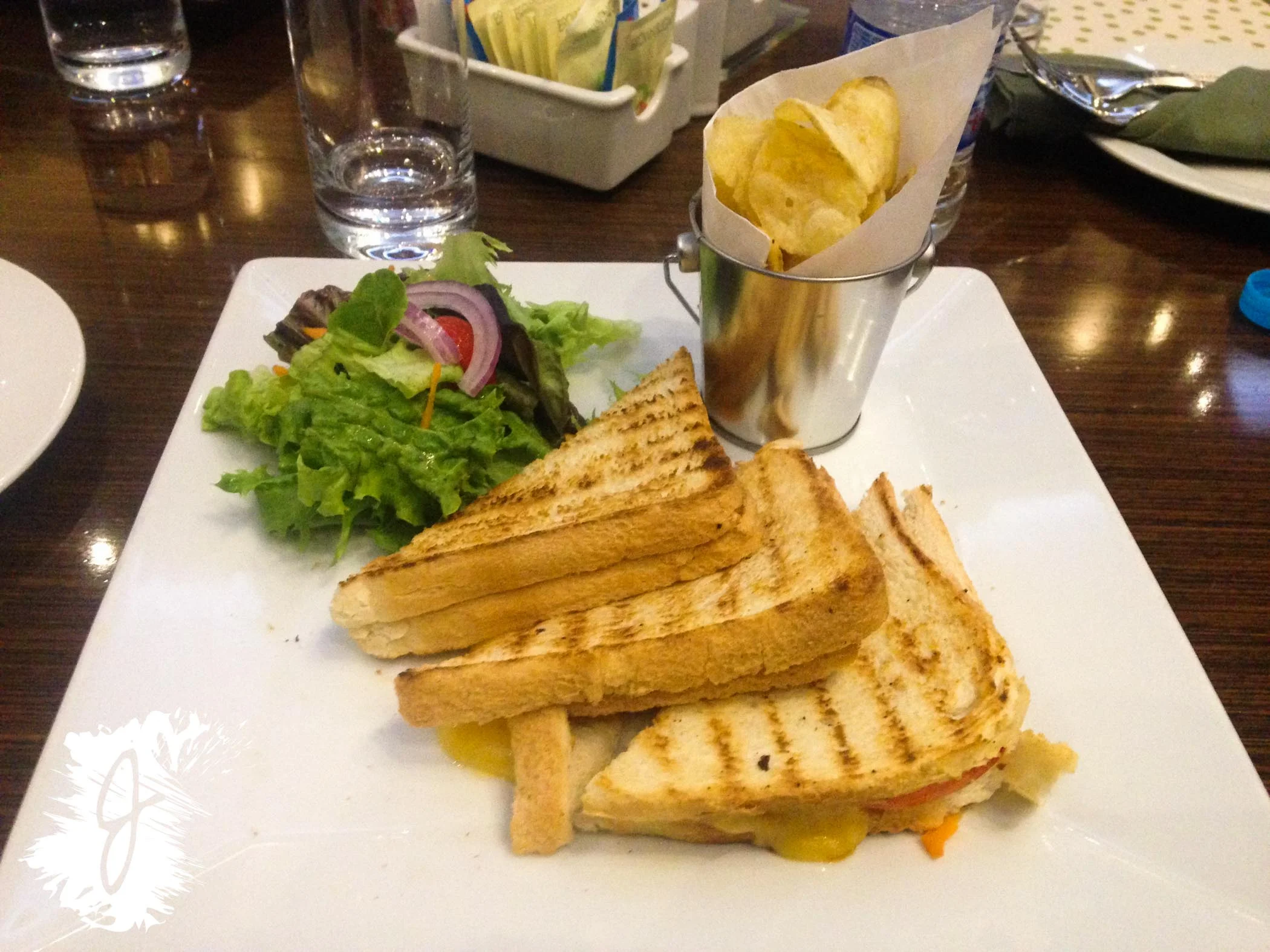  Tomato and cheese sandwich with chips and salad... this was delicious. 