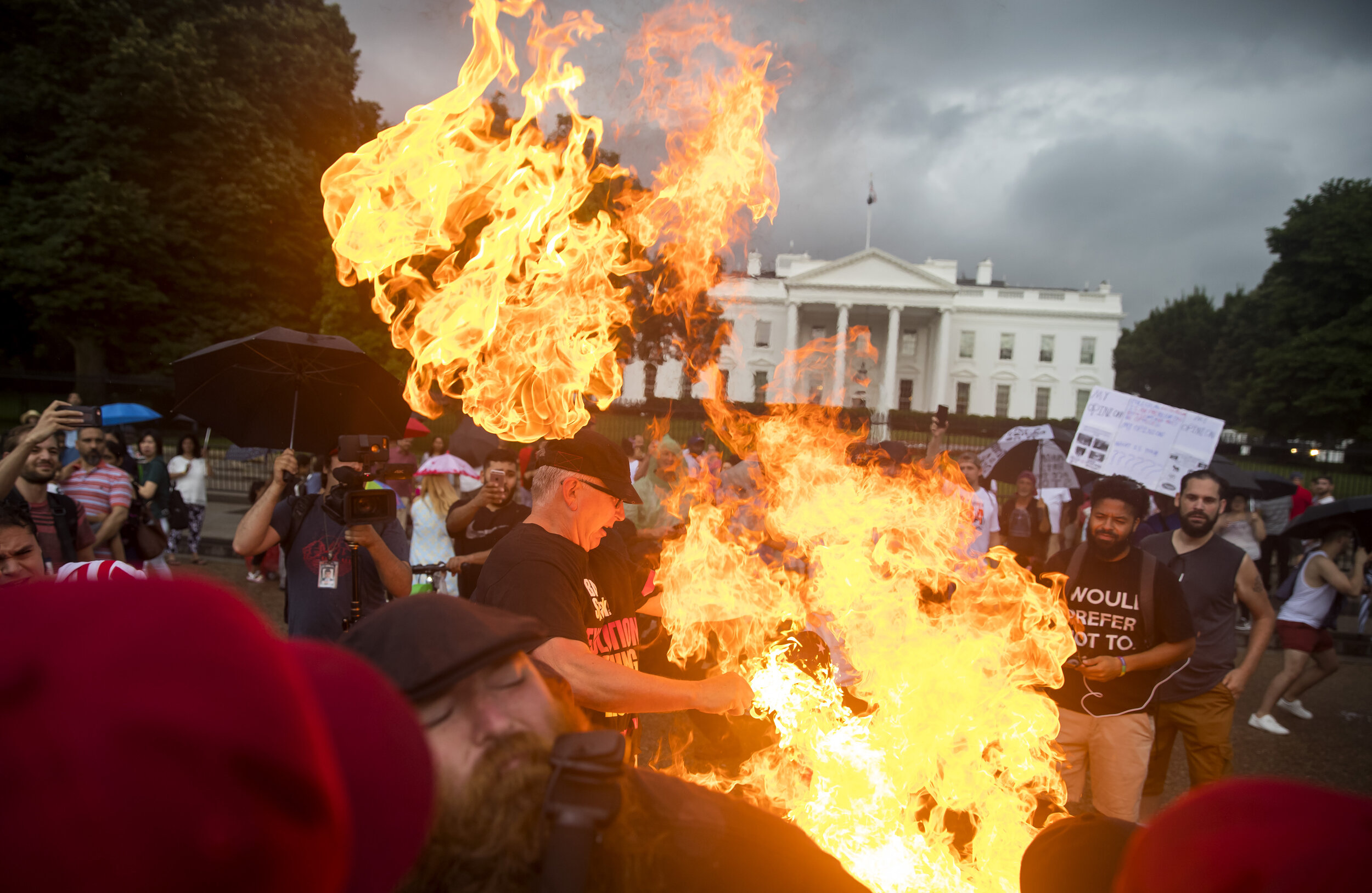   Flag burning on the 4th of July, The White House. Washington DC. 2019  