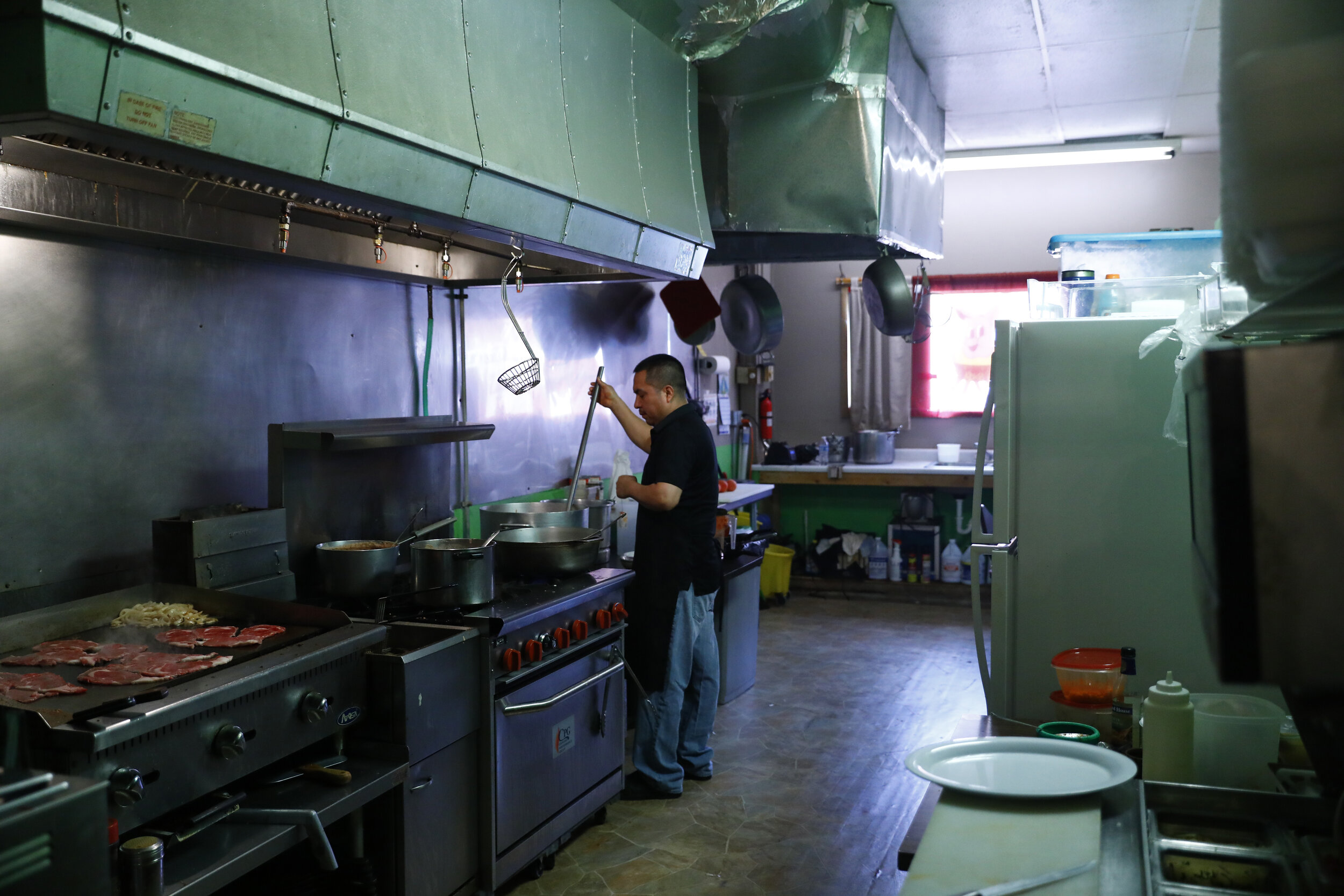   The kitchen of a Mexican restaurant in West Liberty, IA. 2019. The town is in Muscatine County, Iowa, and as of the 2010 U.S. Census was the only city in the state to have a majority Hispanic population.  