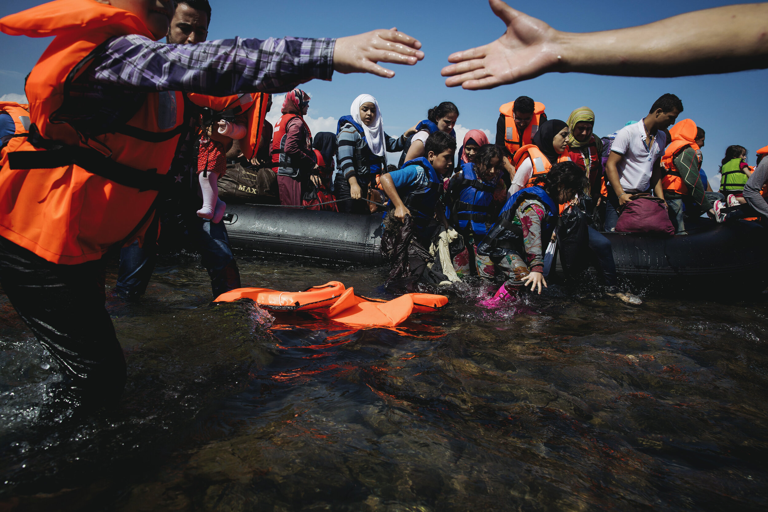   People arrive on rafts from Turkey onto the island of Lesvos, Greece during a mass exodus from Syria. 2015  