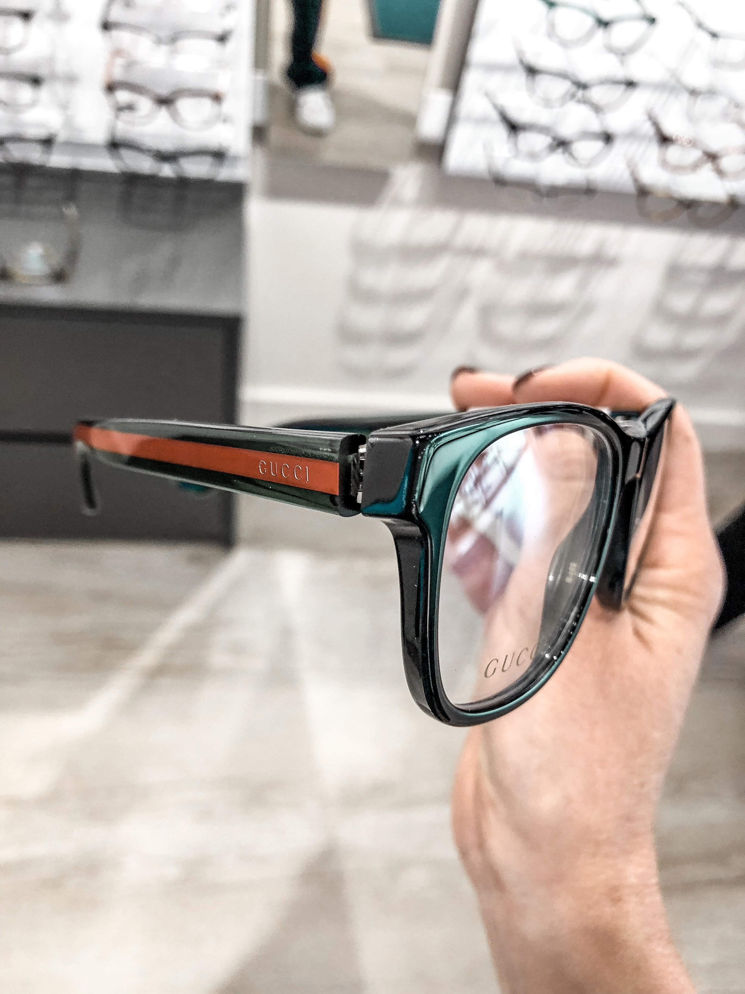 A closeup of Gucci eyeglasses at For Eyes