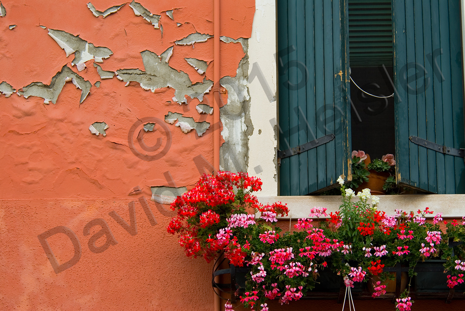 Green shutters and pealing paint