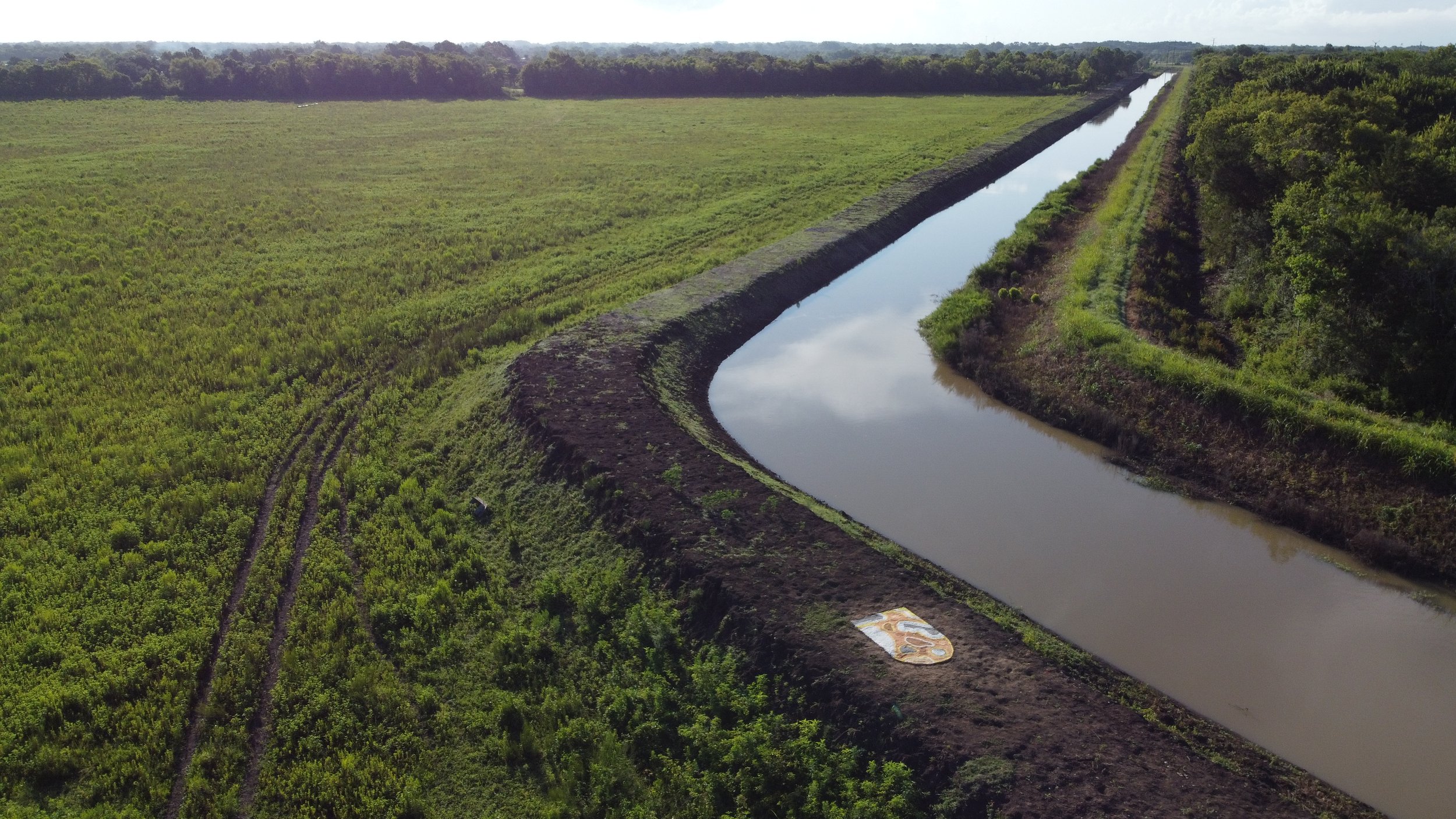  In 1958 my maternal grandfather’s body was found next to a canal on the coast of Texas, where he ended his life.   In 2021 my mother and I returned to the location, transplanting a foreign and reimagined landscape in its spot.  