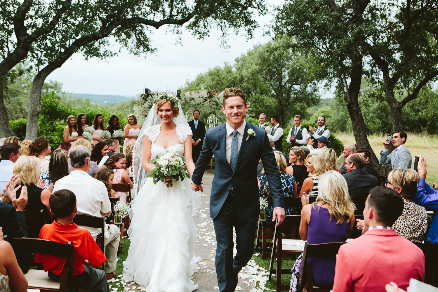 Bride and Groom Walking Down Aisle | Lisa Woods Photography