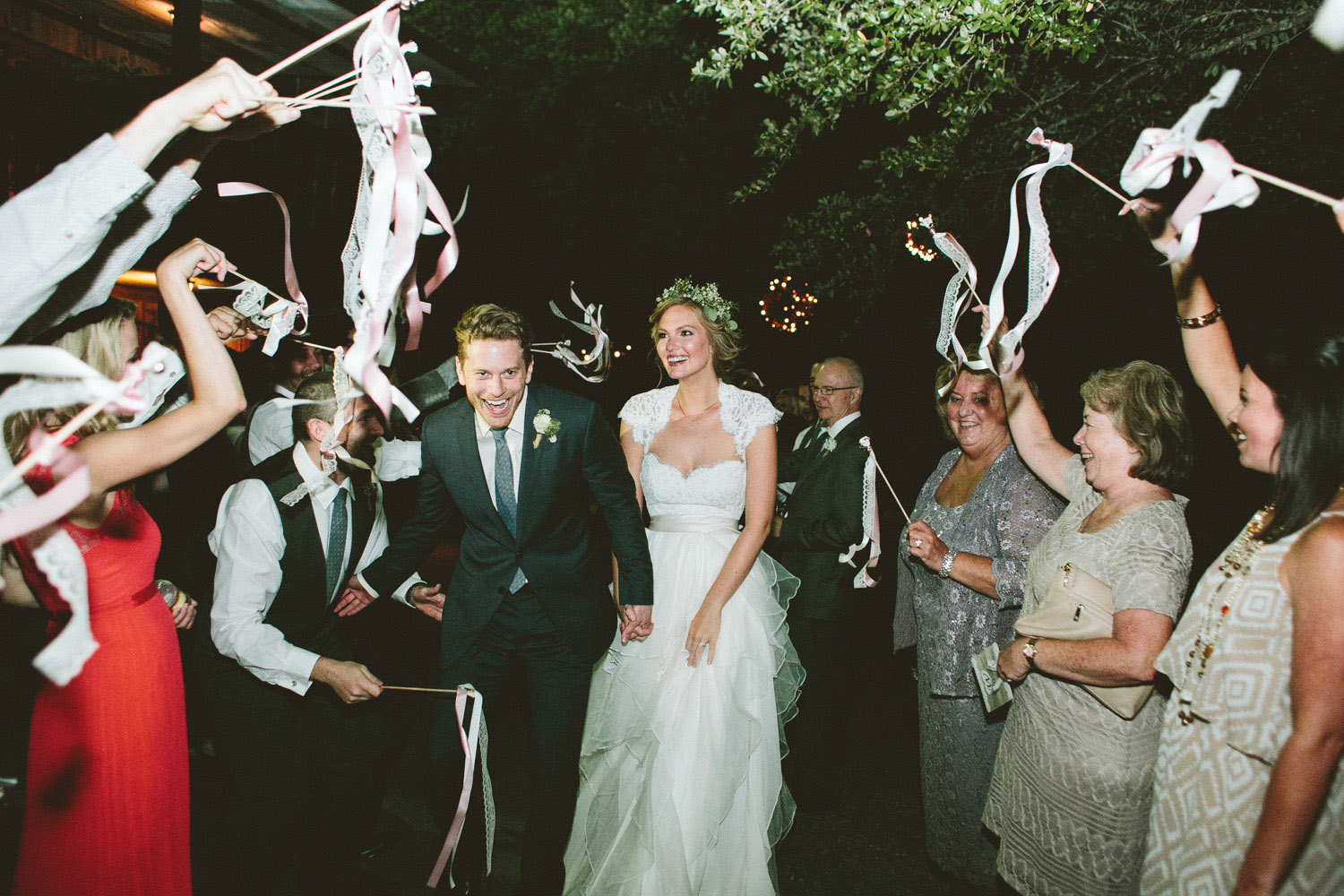 Streamer Grand Exit with Bride and Groom | Lisa Woods Photography