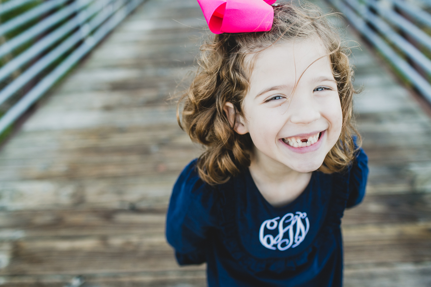 Little Girl with Pink Bow and Monogram Dress | Fall Holiday Family Portraits | Lisa Woods Photography