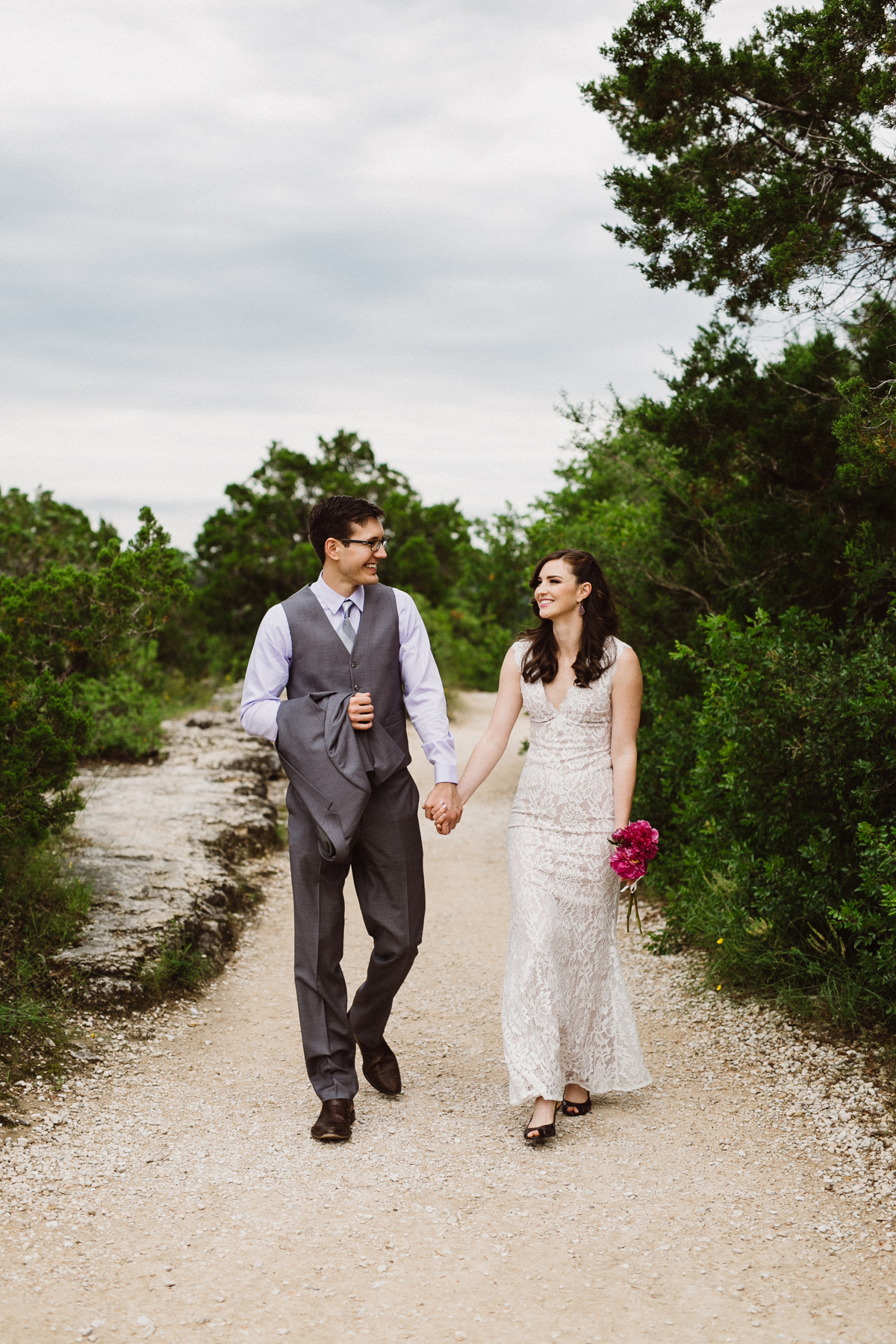 bride and groom at mt. bonnell