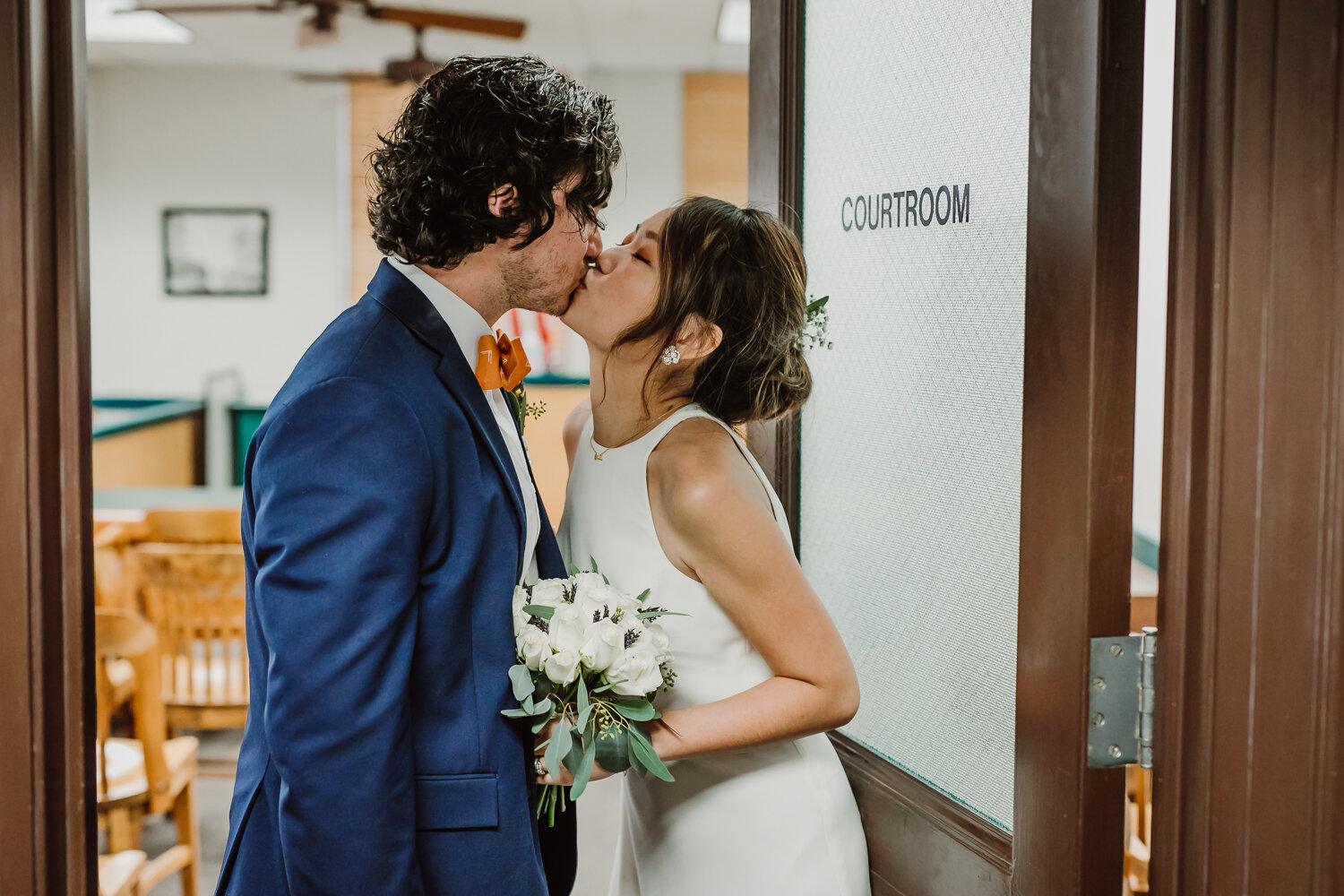 bride and groom inside the courthouse 