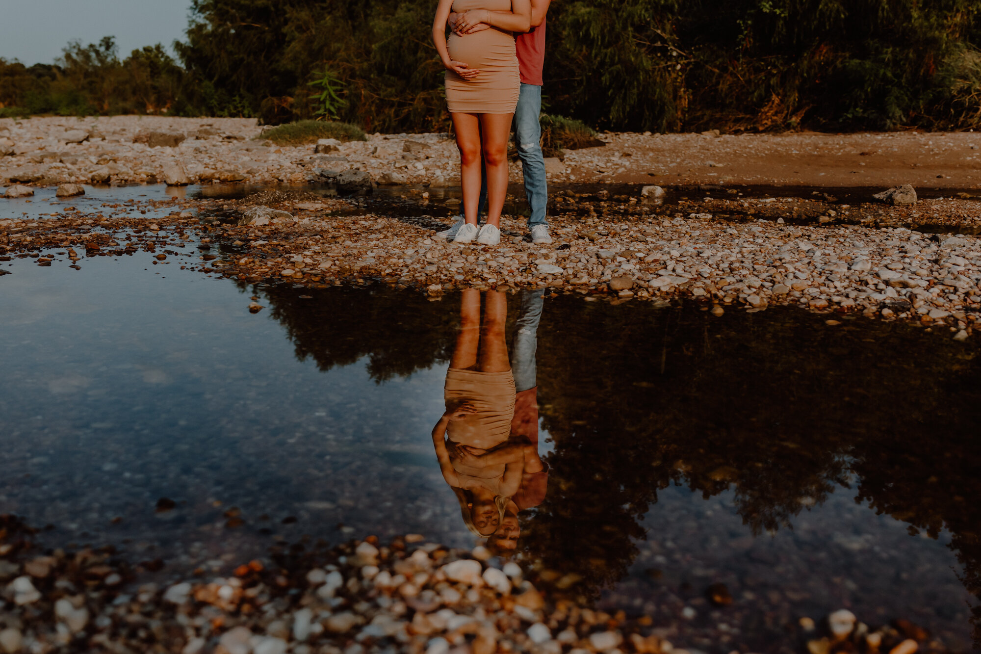 reflection of couple in the river in austin texas