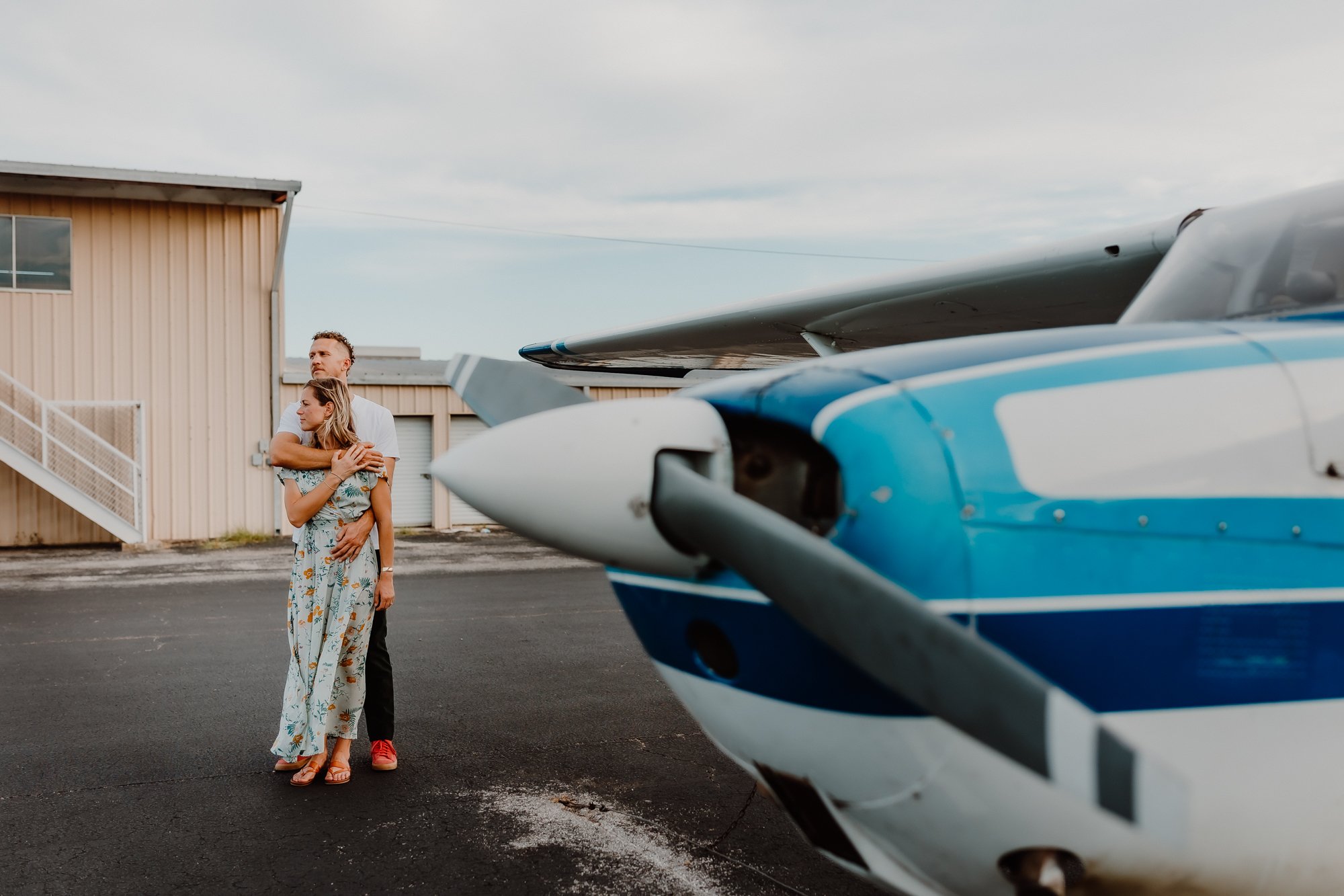 Austin engagement photos at an airplane hangar