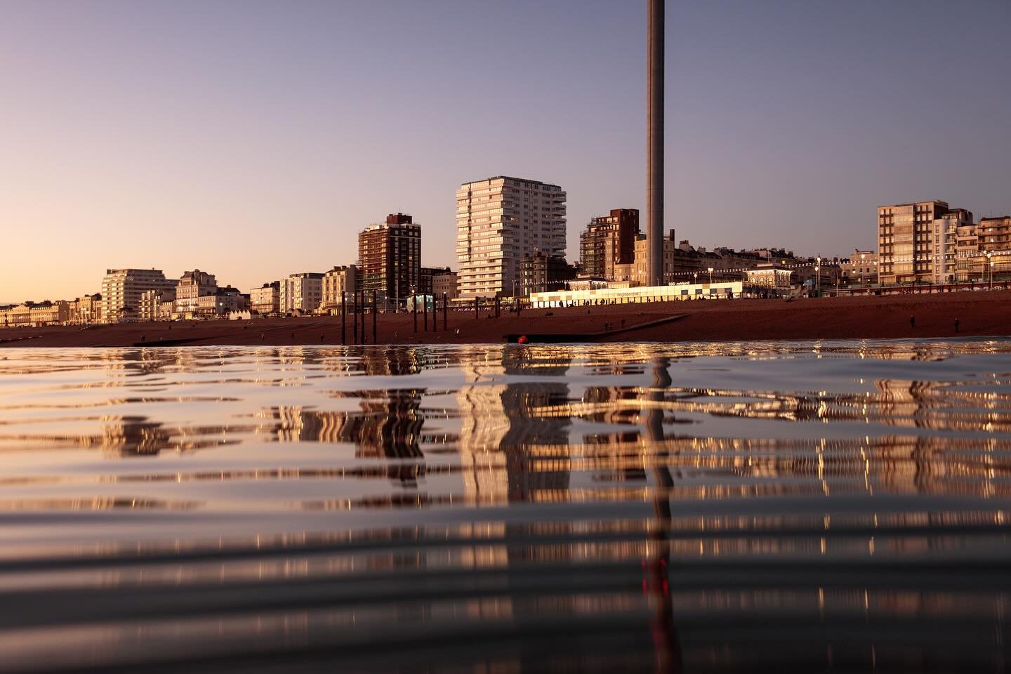 Good morning Brighton. Hope you&rsquo;re all enjoying your new March picture in our &lsquo;Sea Views&rsquo; calendar. Taken during a twilight swim at this time last year. The glow of a winter sunset making Brighton&rsquo;s seafront architecture mishm