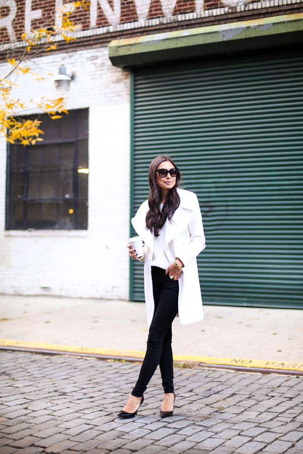 This post is from her Black + White post. That white coat is absolutely stunning! And I love how she kept the focus on the coat by wearing simple black skinny jeans, pumps, and a simple white shirt. This outfit is the definition of effortlessly elegant!