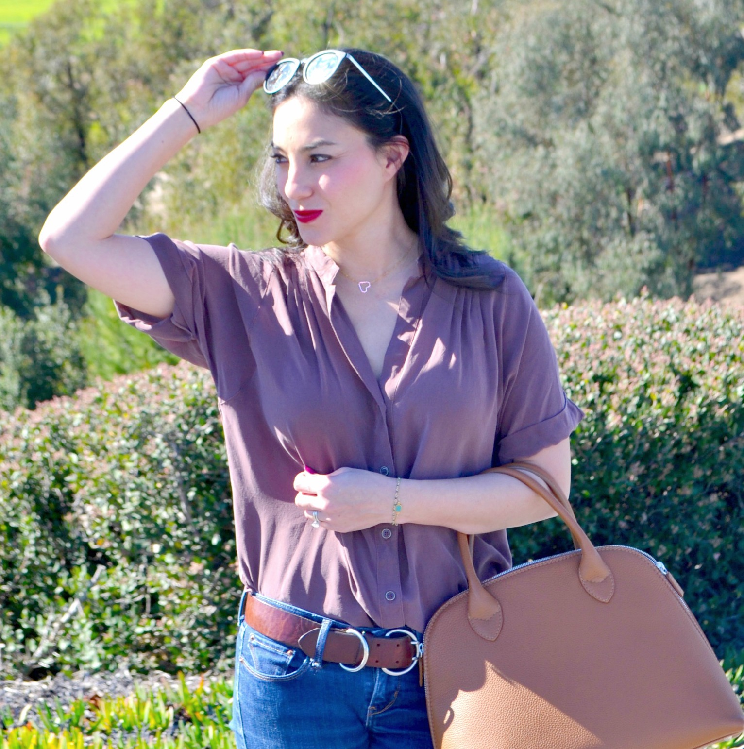 Blouse: Anthropologie / Jeans: Levis / Handbag: School of Leather / Heart Necklace: Boy Cherie / Sunglasses: Le Specs