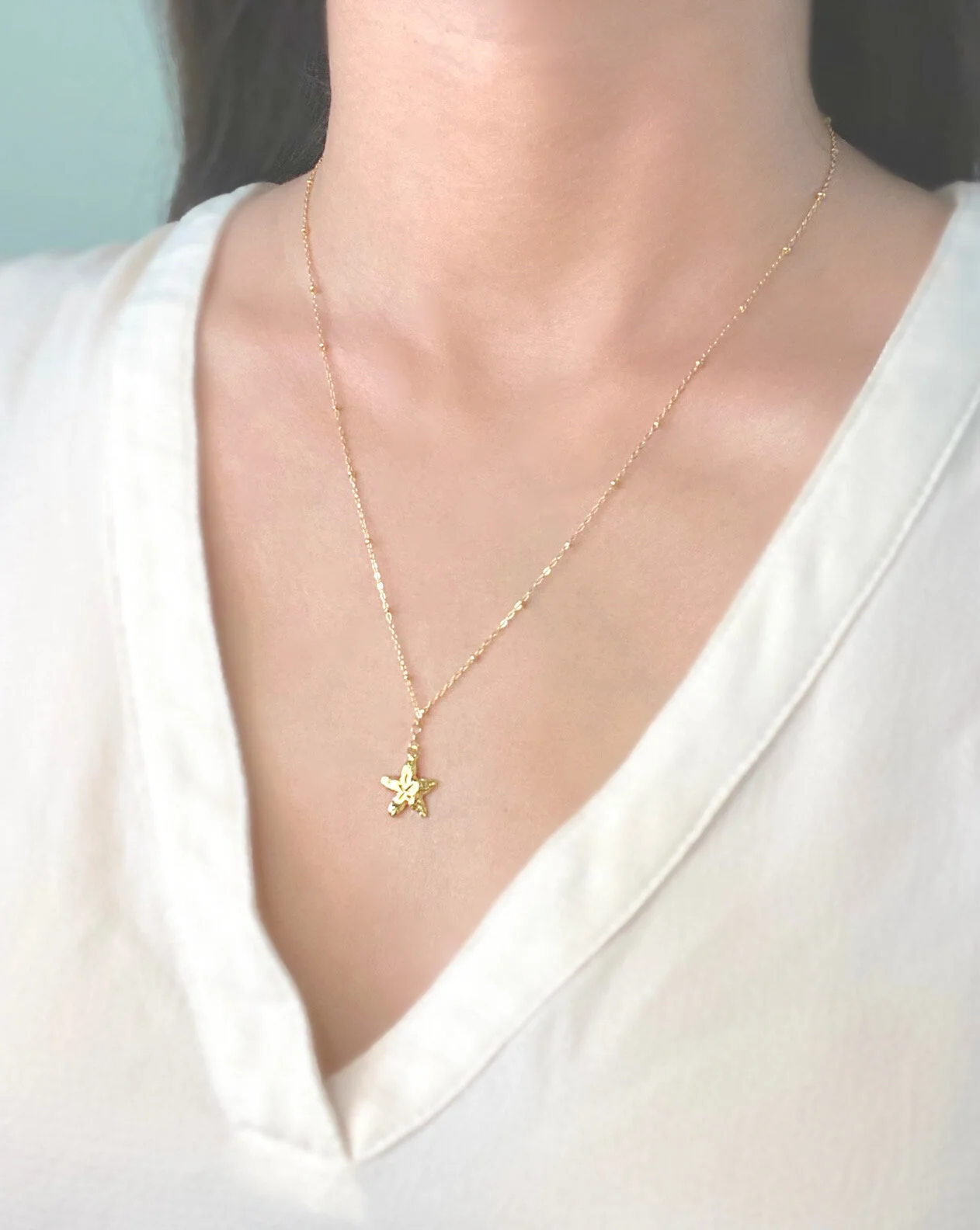 Gold filled dainty small starfish necklace.JPG