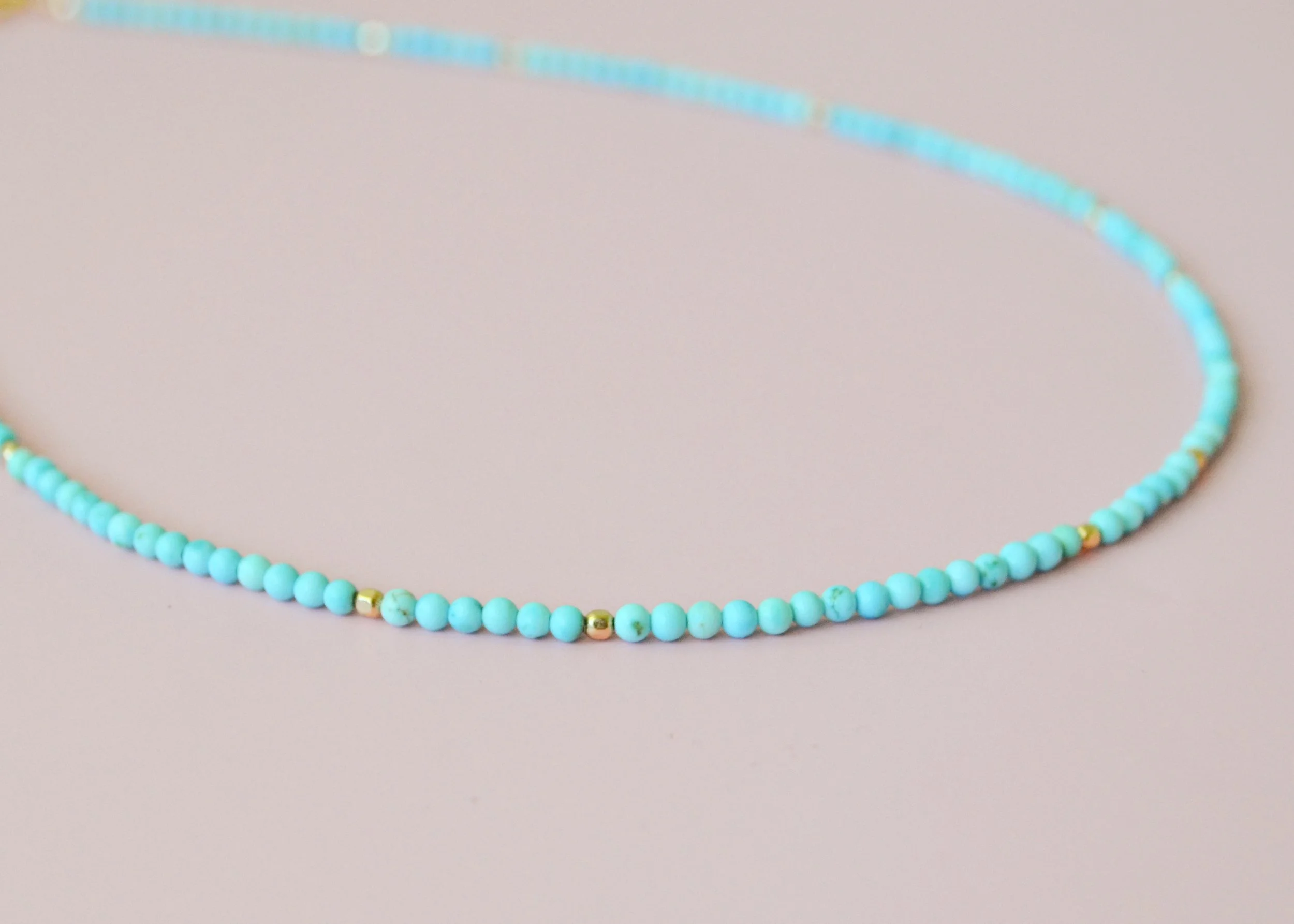 Close up of Gold Filled Turqouise beaded necklace.jpg