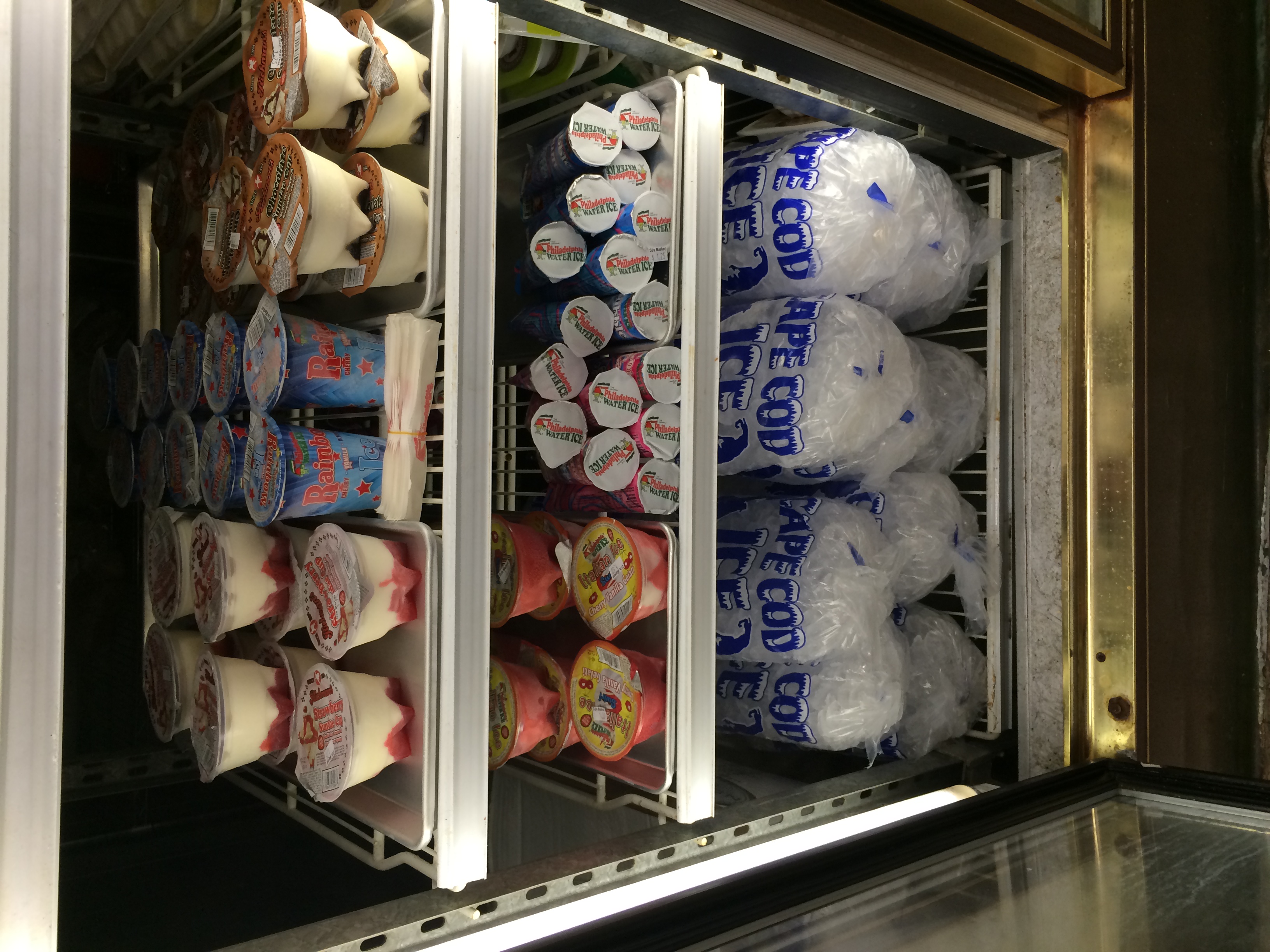 Chocolate ice cream sundae cups, strawberry ice cream sundae cups, Italian ices, and bags of ice, and more