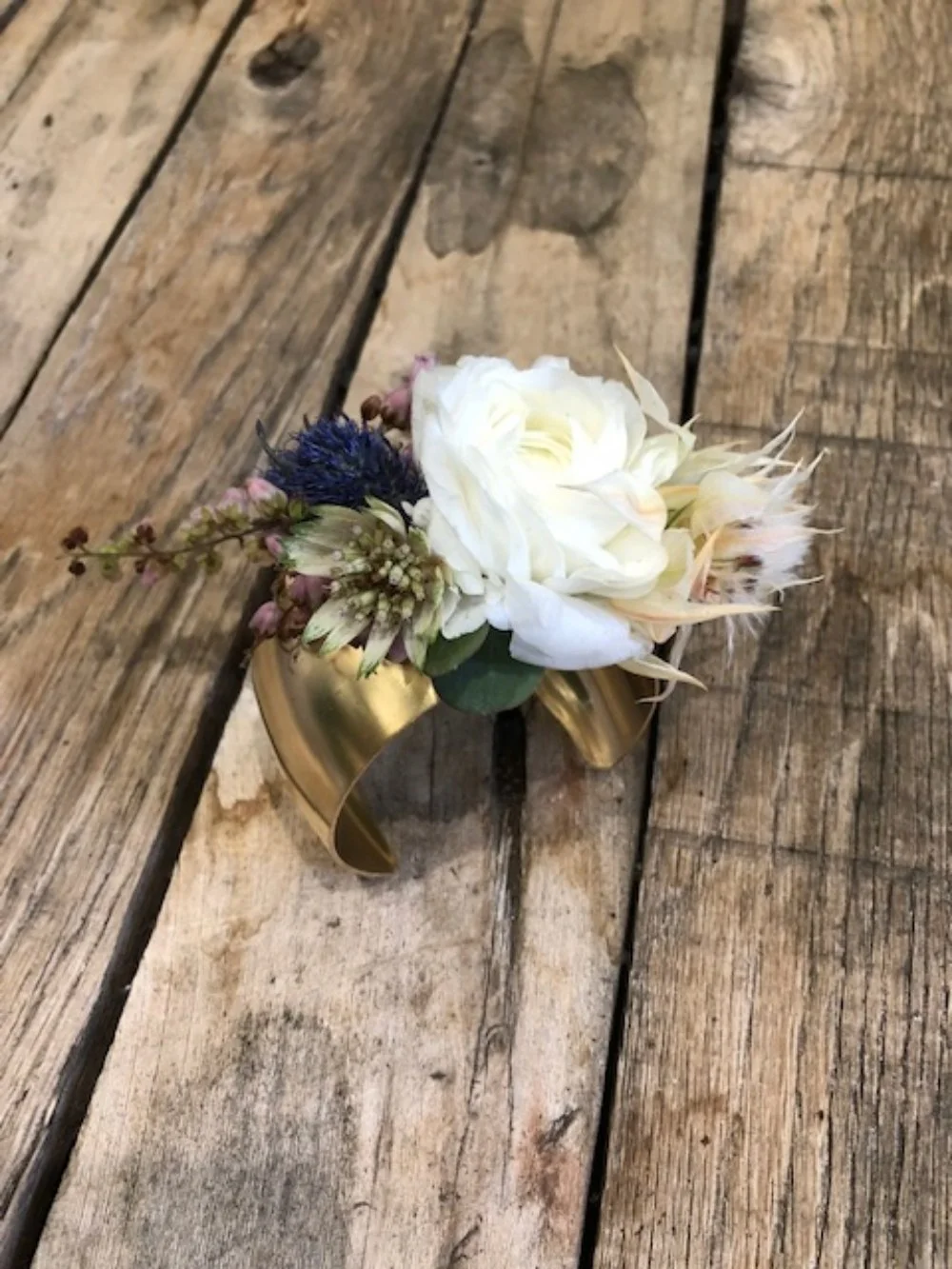 ranunculus wristlet on gold cuff