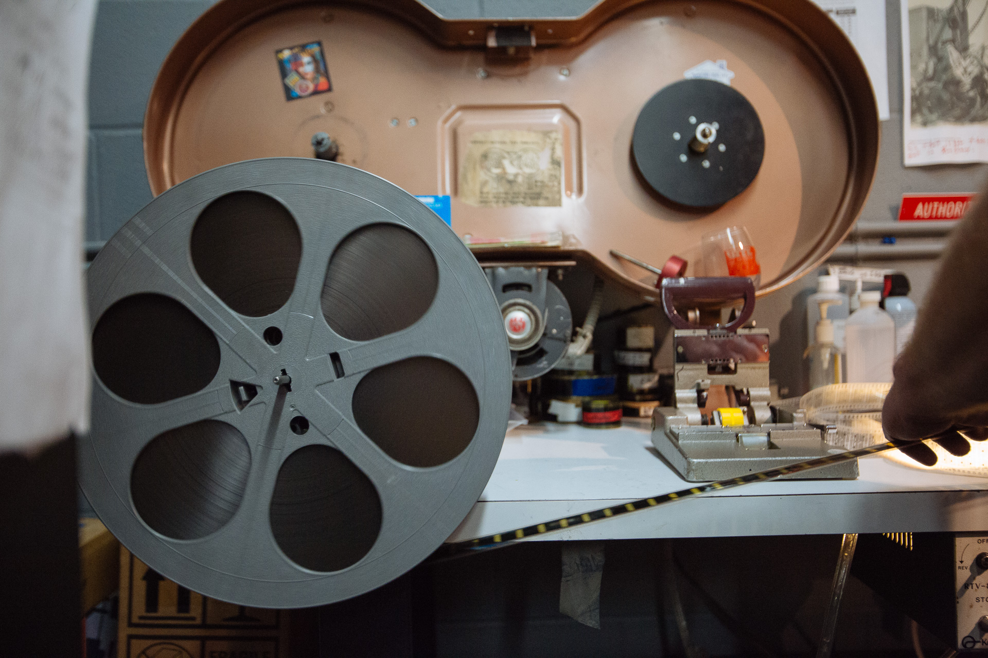  S.I.F.F Projectionist Larry Price rolls film onto a reel 