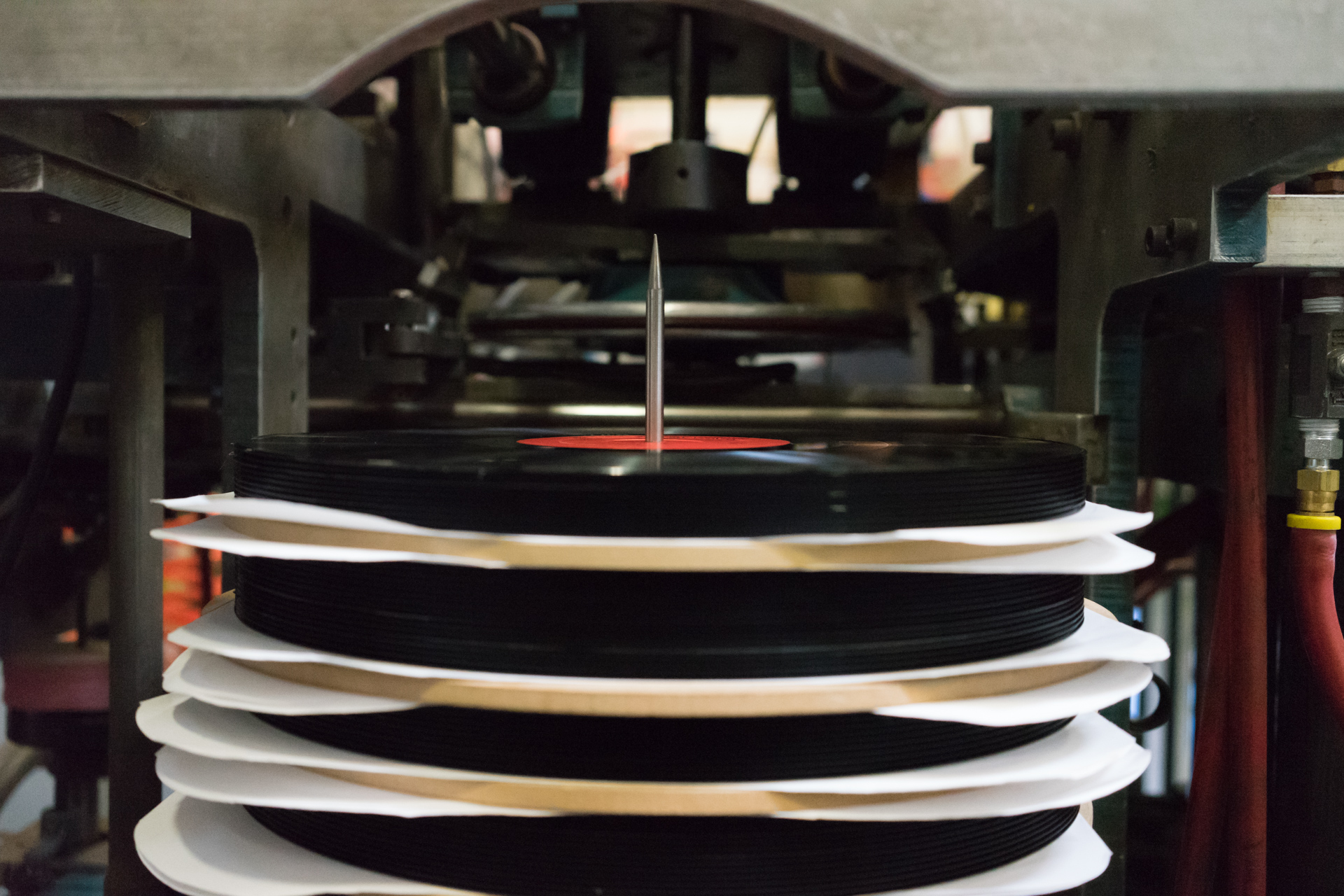  Pressed vinyl records are stacked to cool 