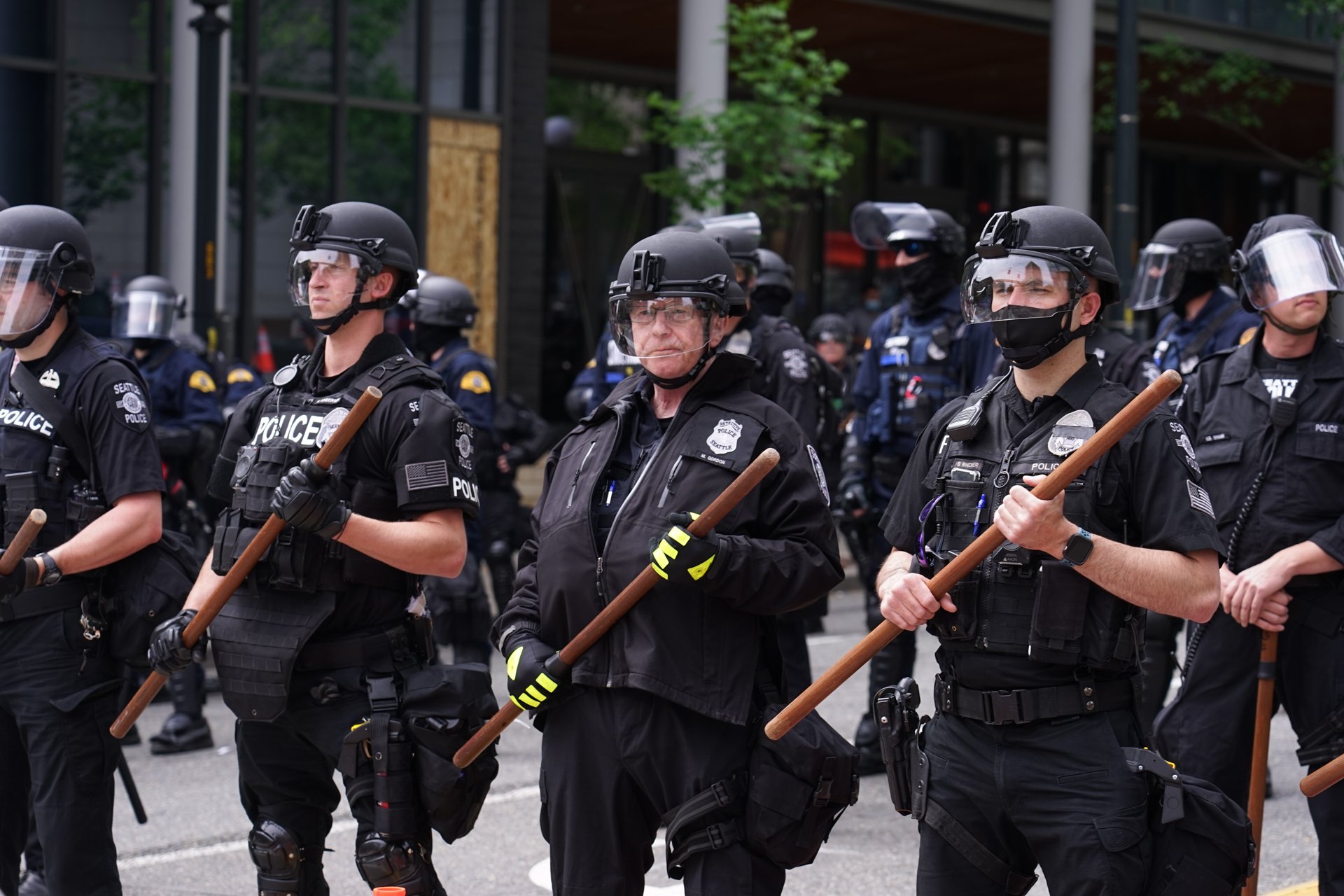  A frontline of Seattle Police Officers during protests following the death of George Floyd. July 2020 in Downtown Seattle.  