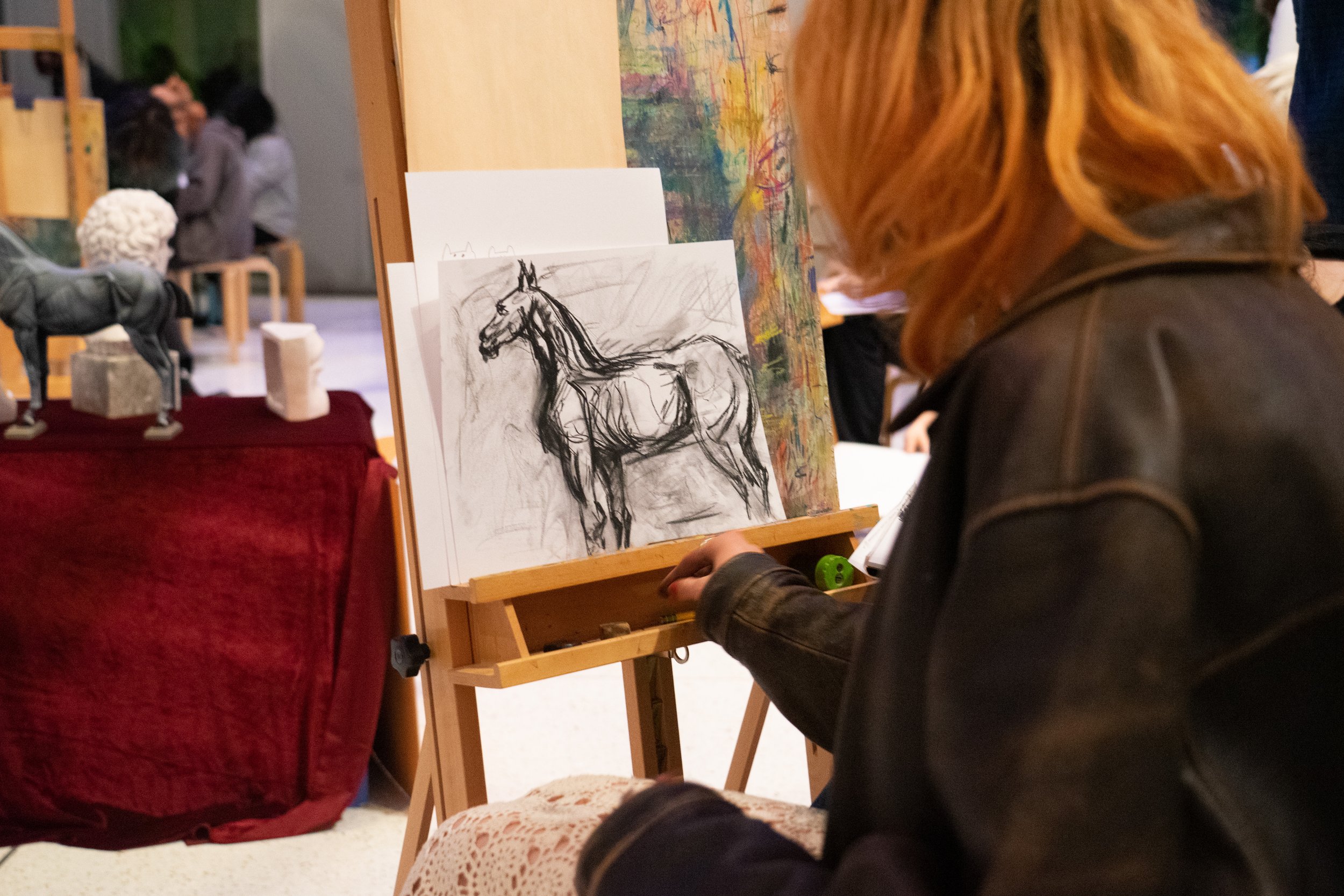  A teenage artist live-sketches a horse at the annual ‘Teen Night Out’ at Seattle Art Museum.  